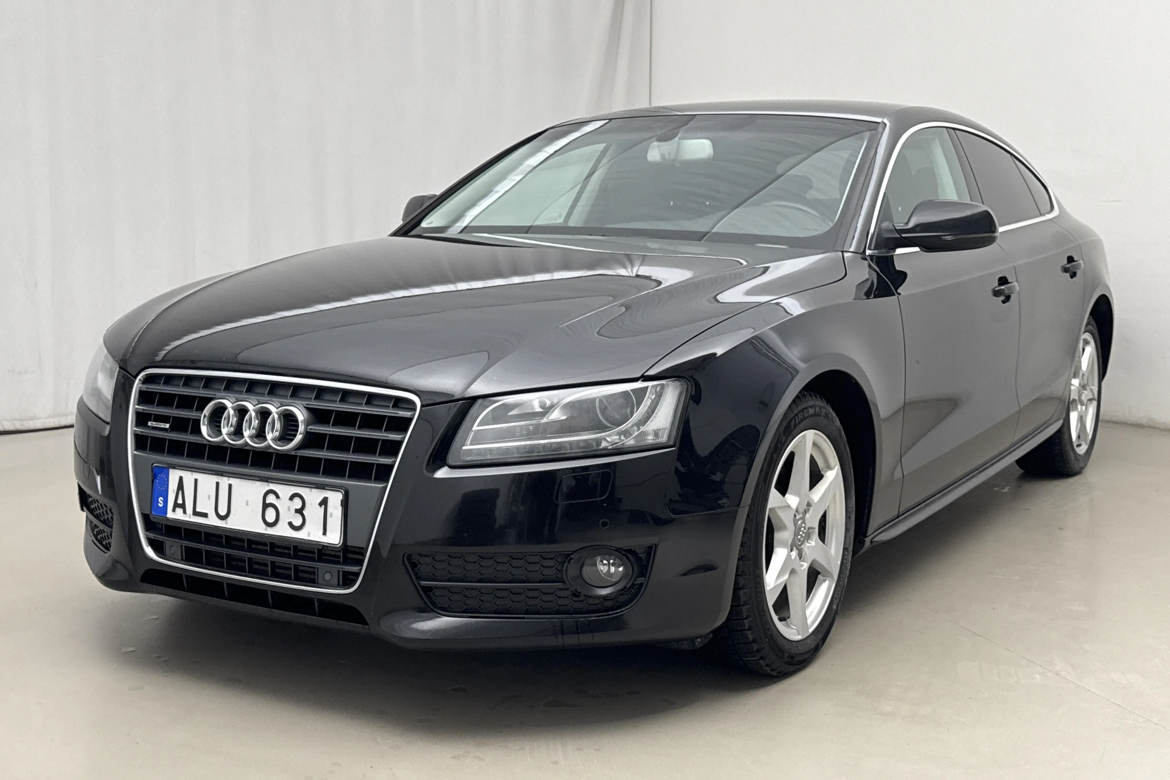 Presentationsfoto 1 av 14: Audi A5 2.0 TFSI Sportback quattro (211hk) - 13 512 mil - Manuell - svart - 2011