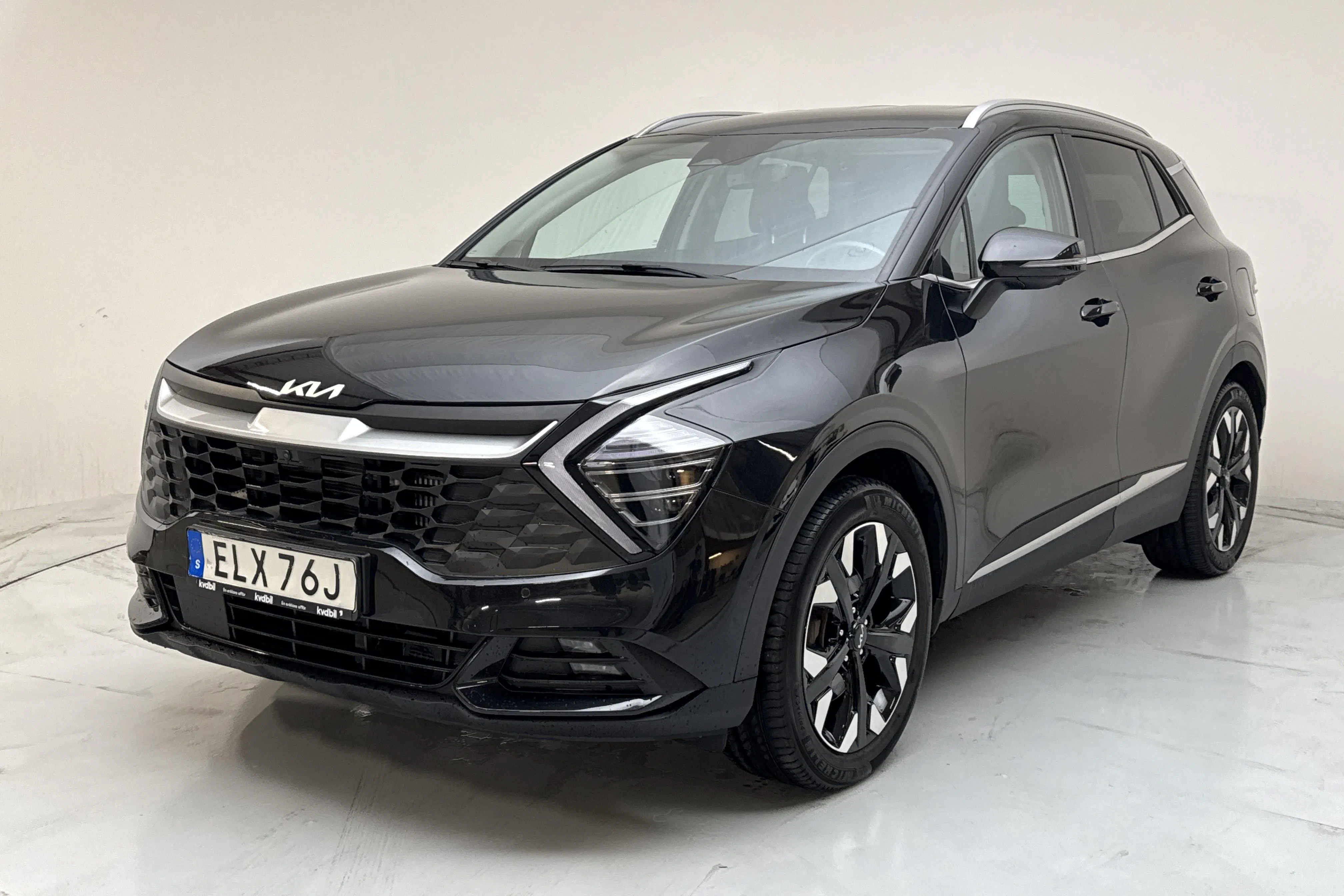 Presentationsfoto 1 av 17: KIA Sportage PHEV AWD (265hk) - 7 304 mil - Automat - svart - 2022