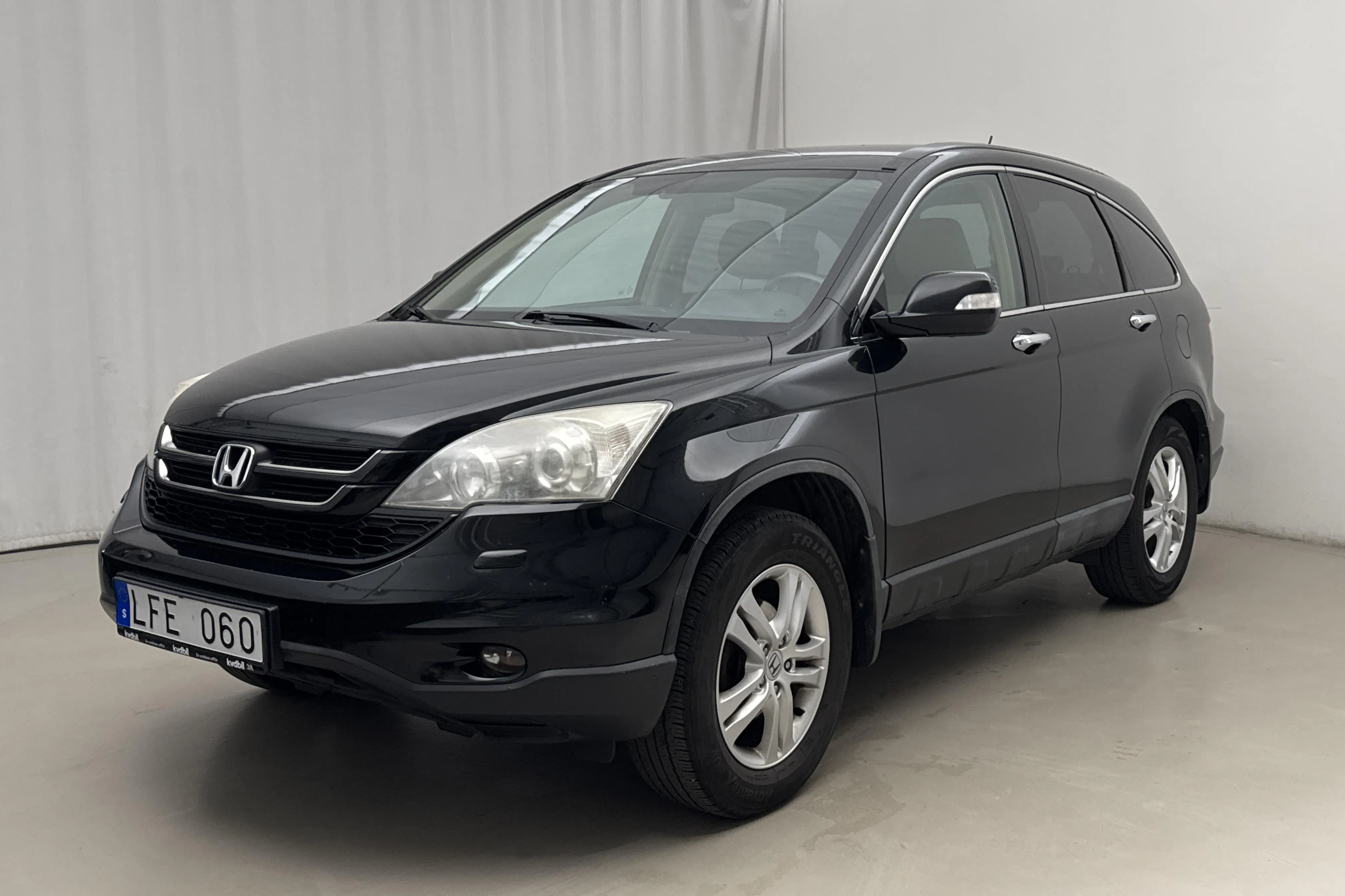 Presentation photo 1 of 12: Honda CR-V 2.0 I-VTEC (150hk) - 195 420 km - Manual - black - 2011