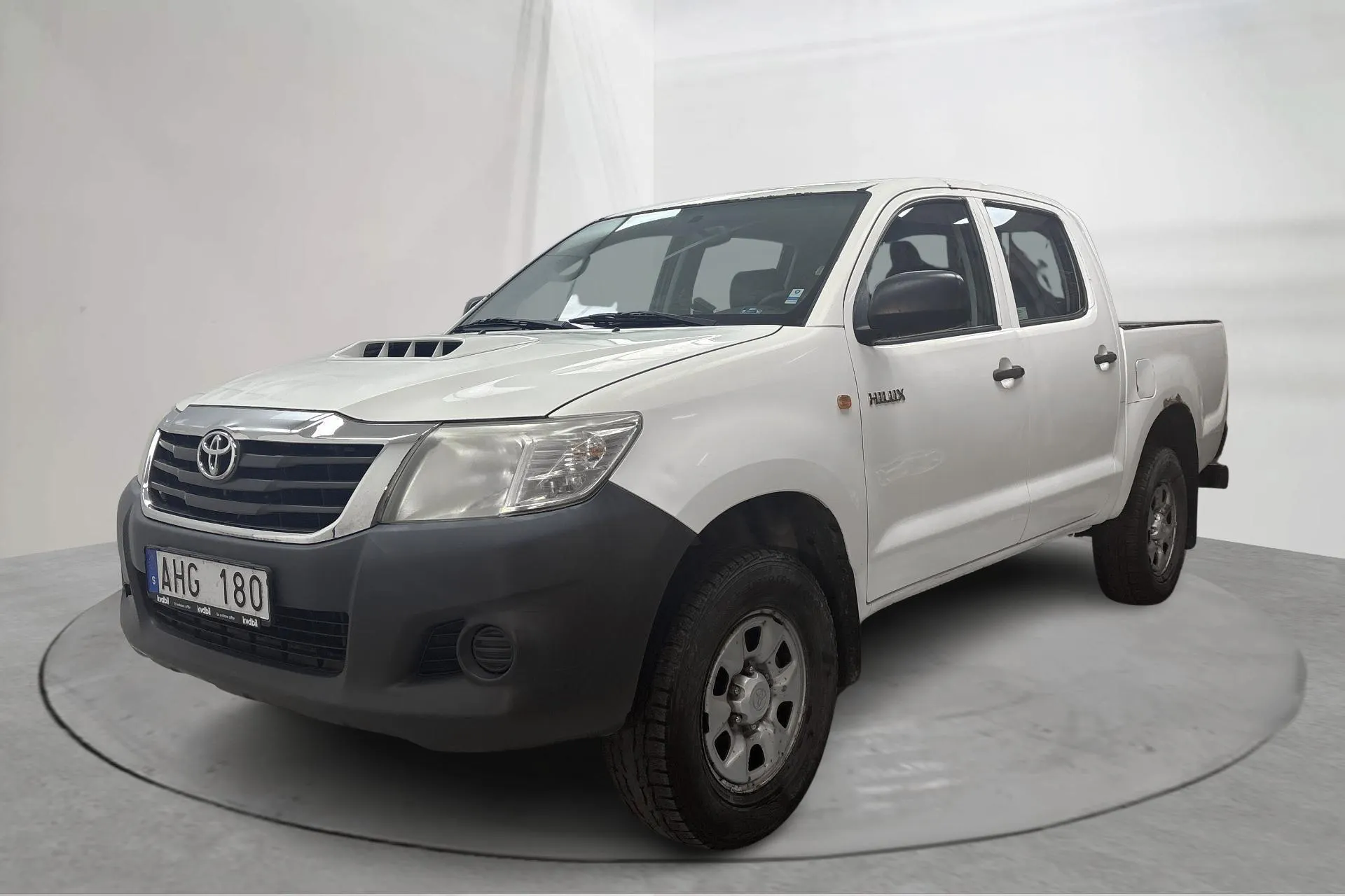 Presentationsfoto 1 av 14: Toyota Hilux 2.5 D-4D 4WD (144hk) - 18 732 mil - Manuell - vit - 2013