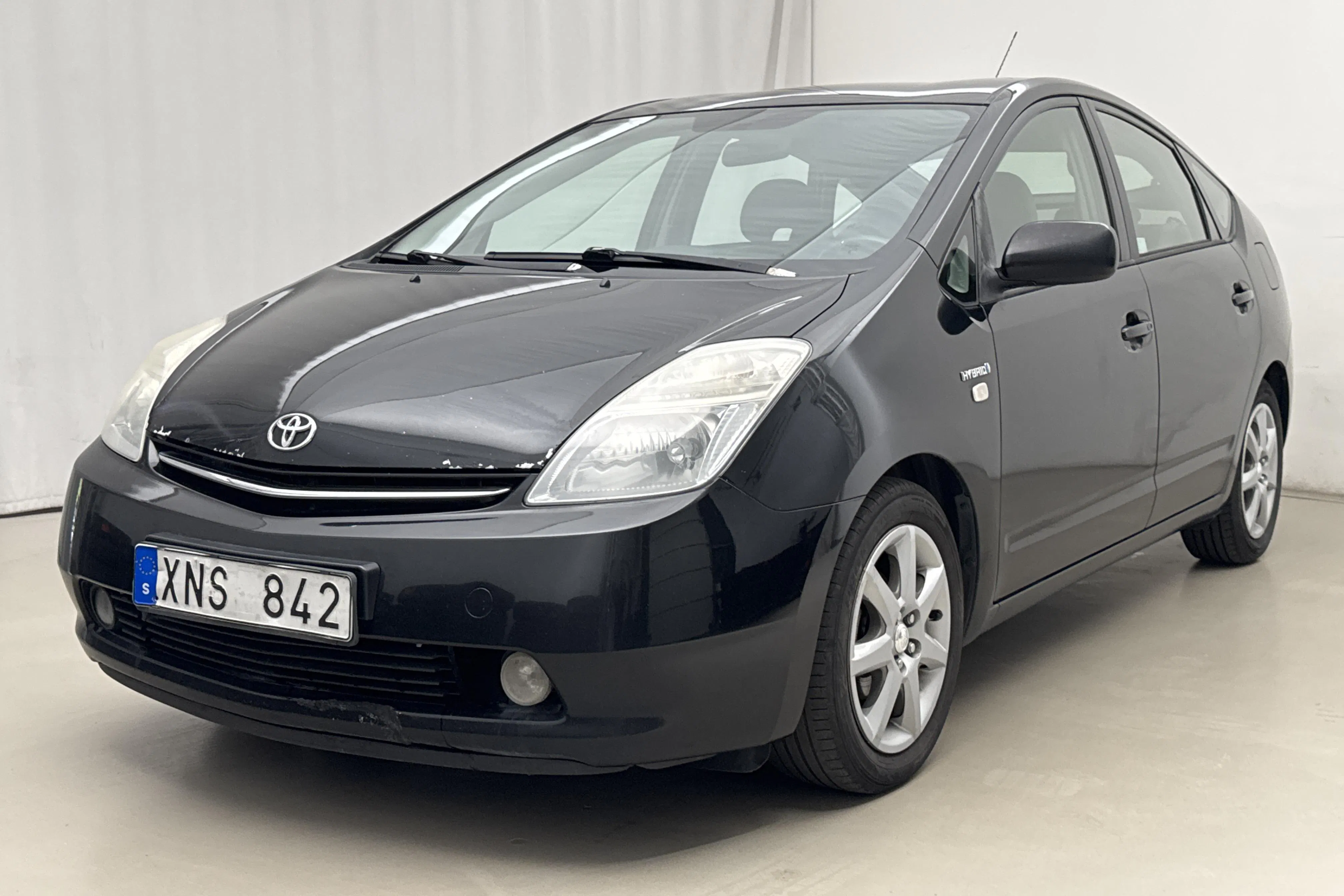Presentation photo 1 of 15: Toyota Prius 1.5 Hybrid (78hk) - 295 400 km - Automatic - black - 2006
