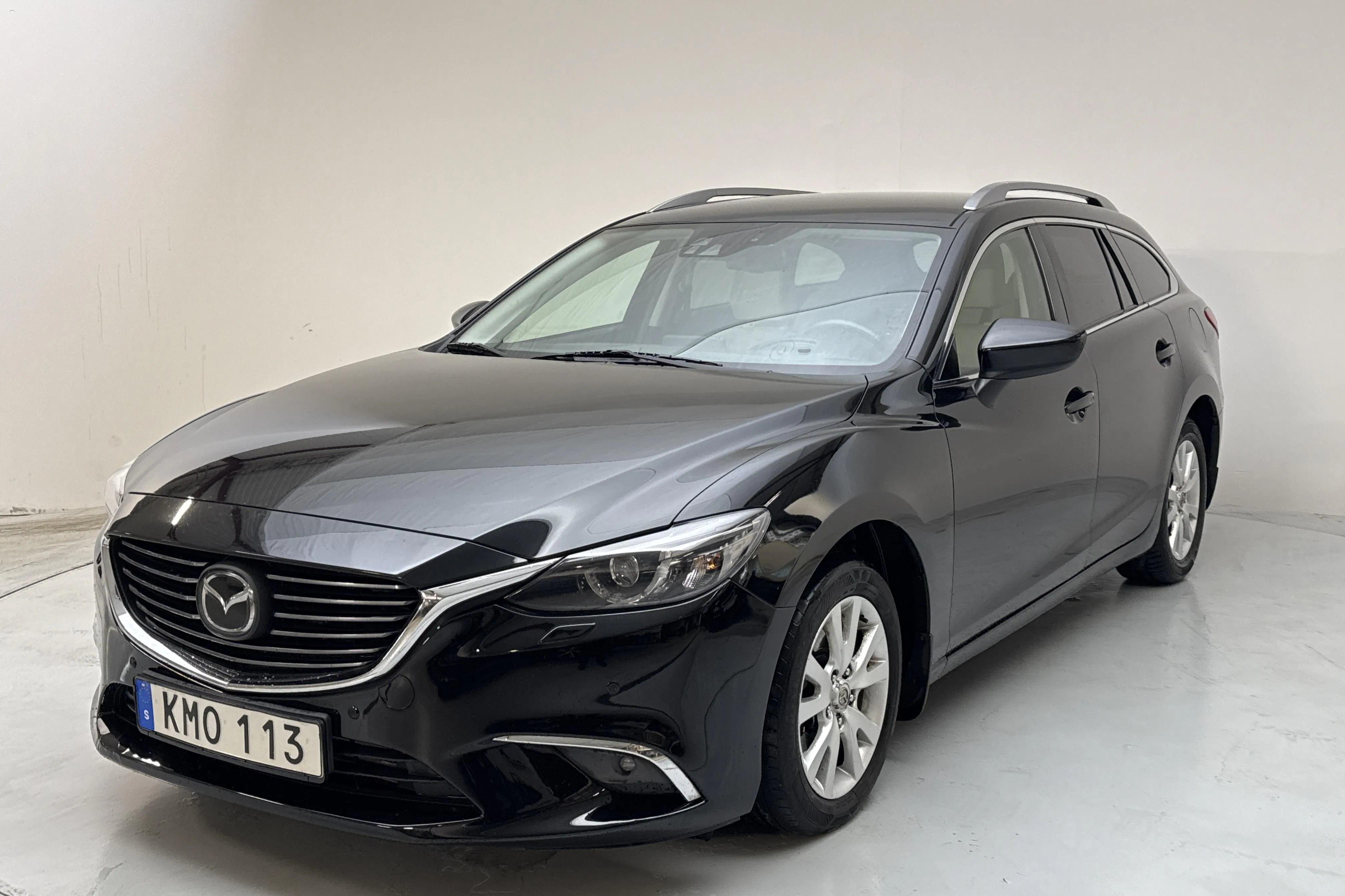 Presentationsfoto 1 av 15: Mazda 6 2.2 DE Kombi AWD (175hk) - 24 235 mil - Automat - svart - 2015