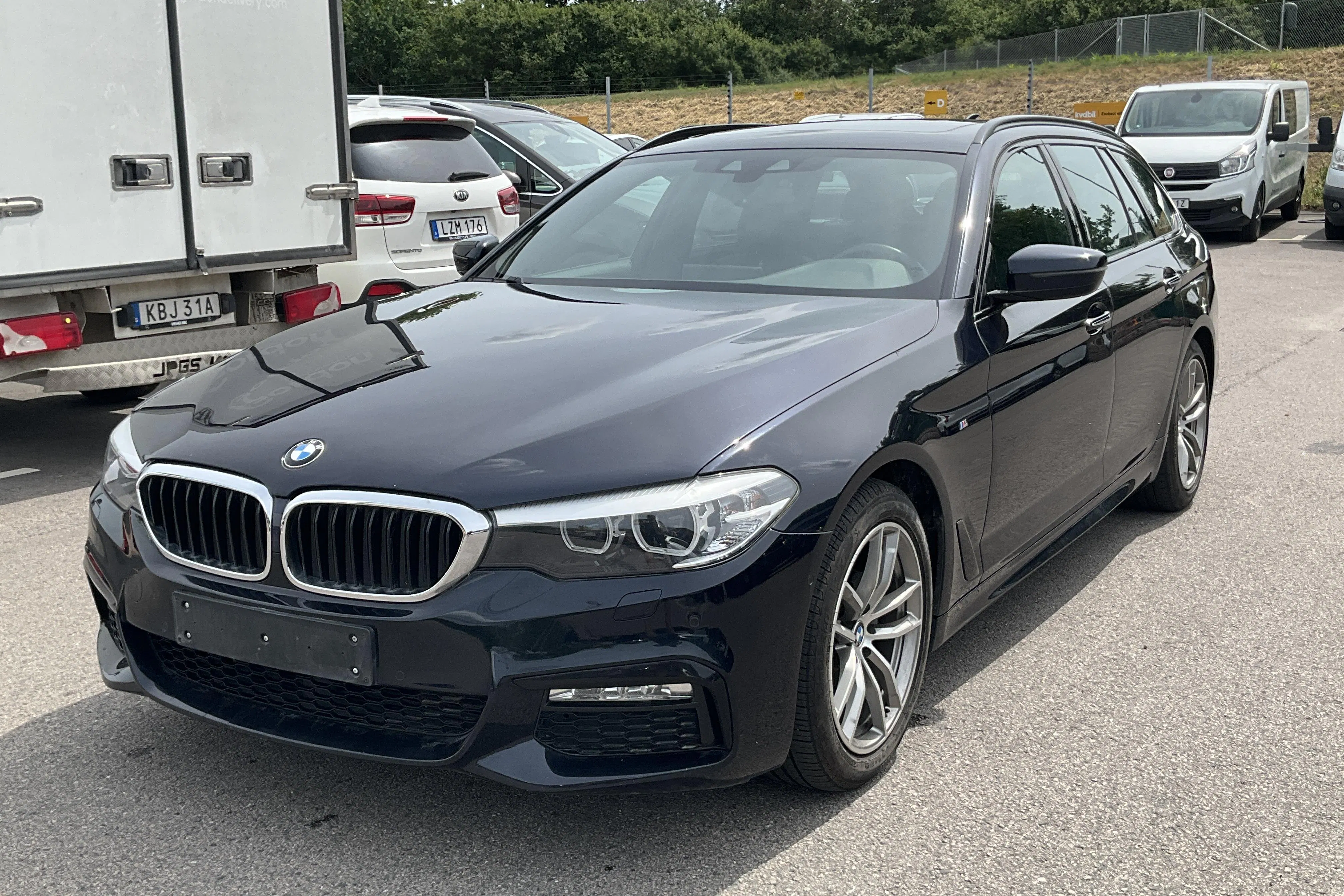Presentationsfoto 1 av 14: BMW 520d Touring, G31 (190hk) - 11 455 mil - Automat - svart - 2018
