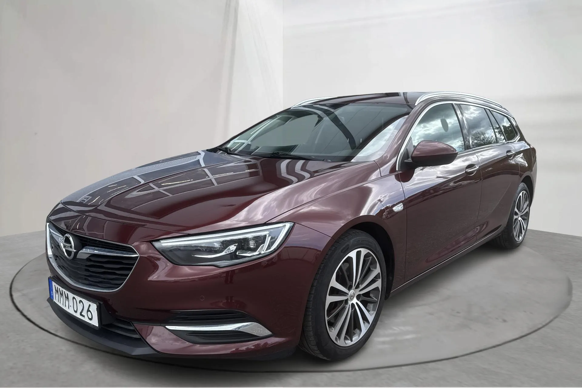 Presentation photo 1 of 14: Opel Insignia 1.5 Turbo Sports Tourer (165hk) - 142 280 km - Automatic - dark red - 2018