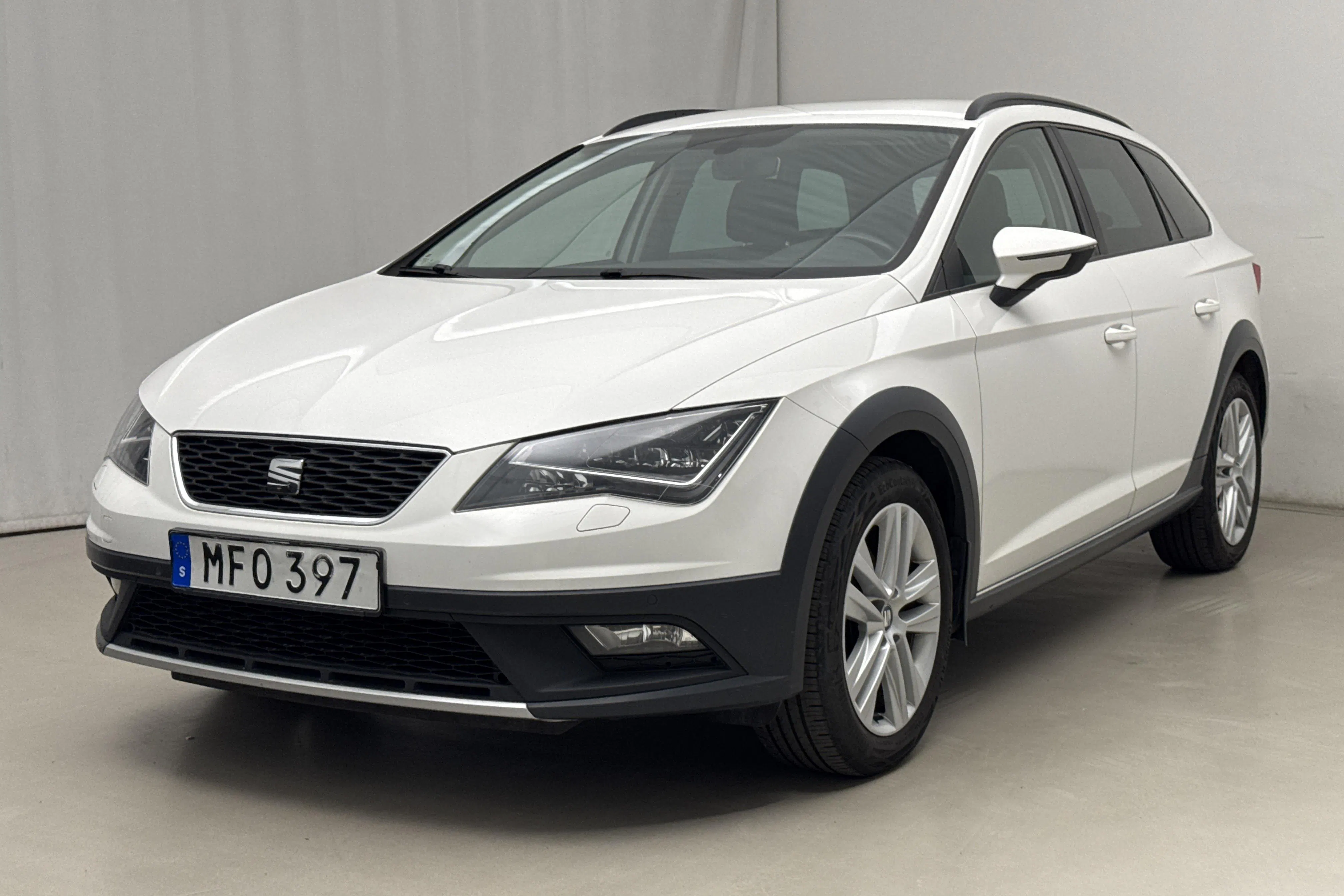 Presentationsfoto 1 av 17: Seat Leon 1.4 TSI ST X-Perience (125hk) - 12 646 mil - Manuell - vit - 2016