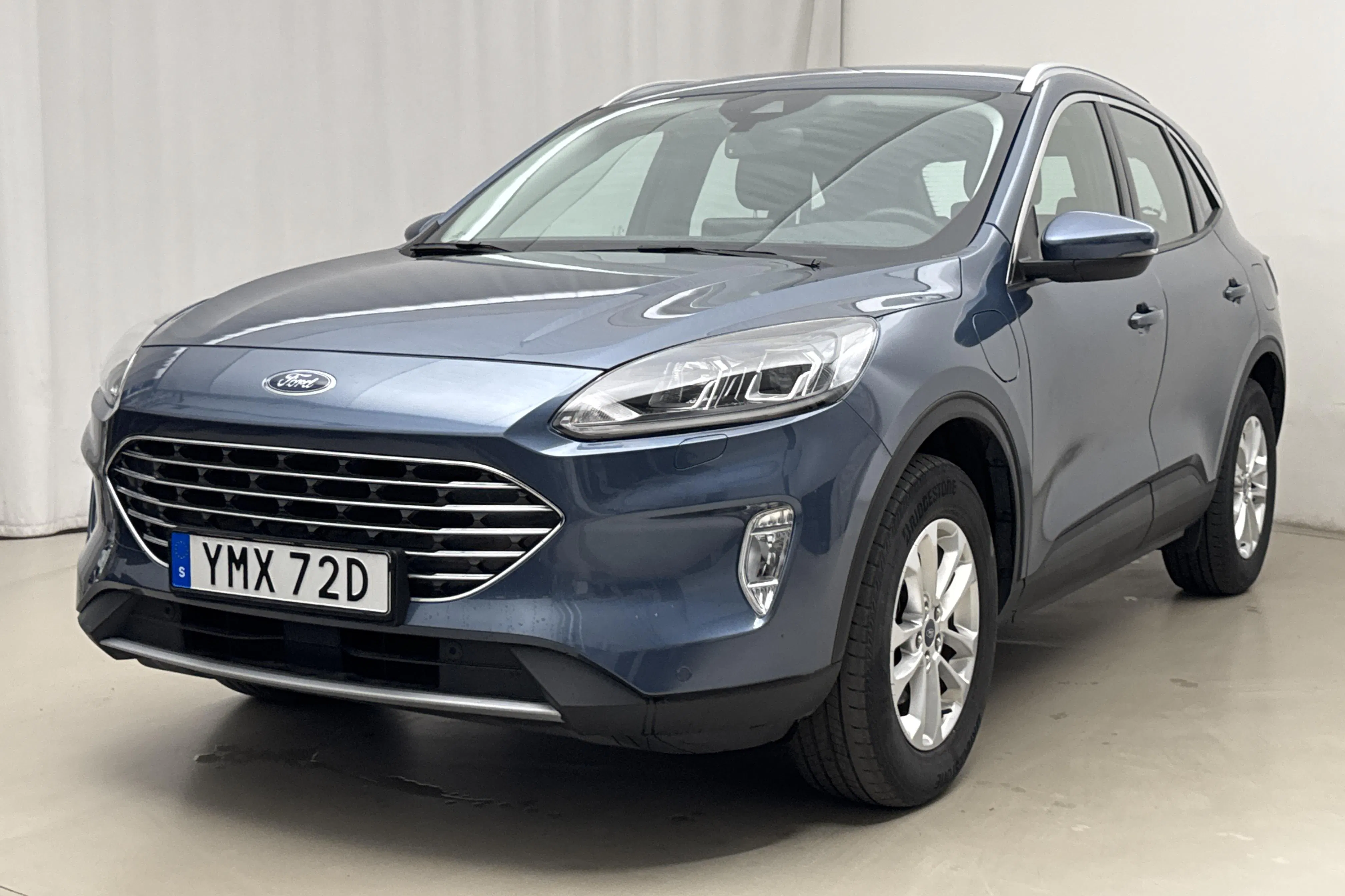 Presentation photo 1 of 21: Ford Kuga 2.5 PHEV (225hk) - 41 390 km - Automatic - blue - 2022