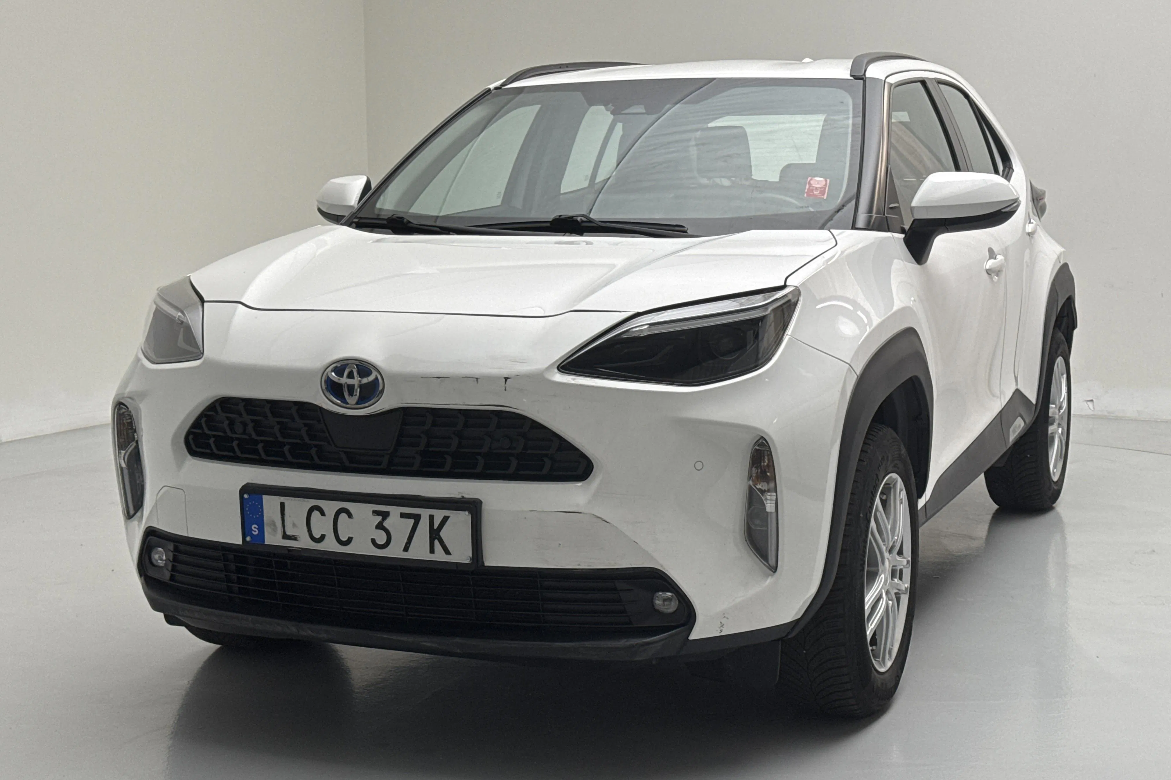 Presentation photo 1 of 14: Toyota Yaris Cross 1.5 Hybrid AWD (116hk) - 117 200 km - Automatic - white - 2023