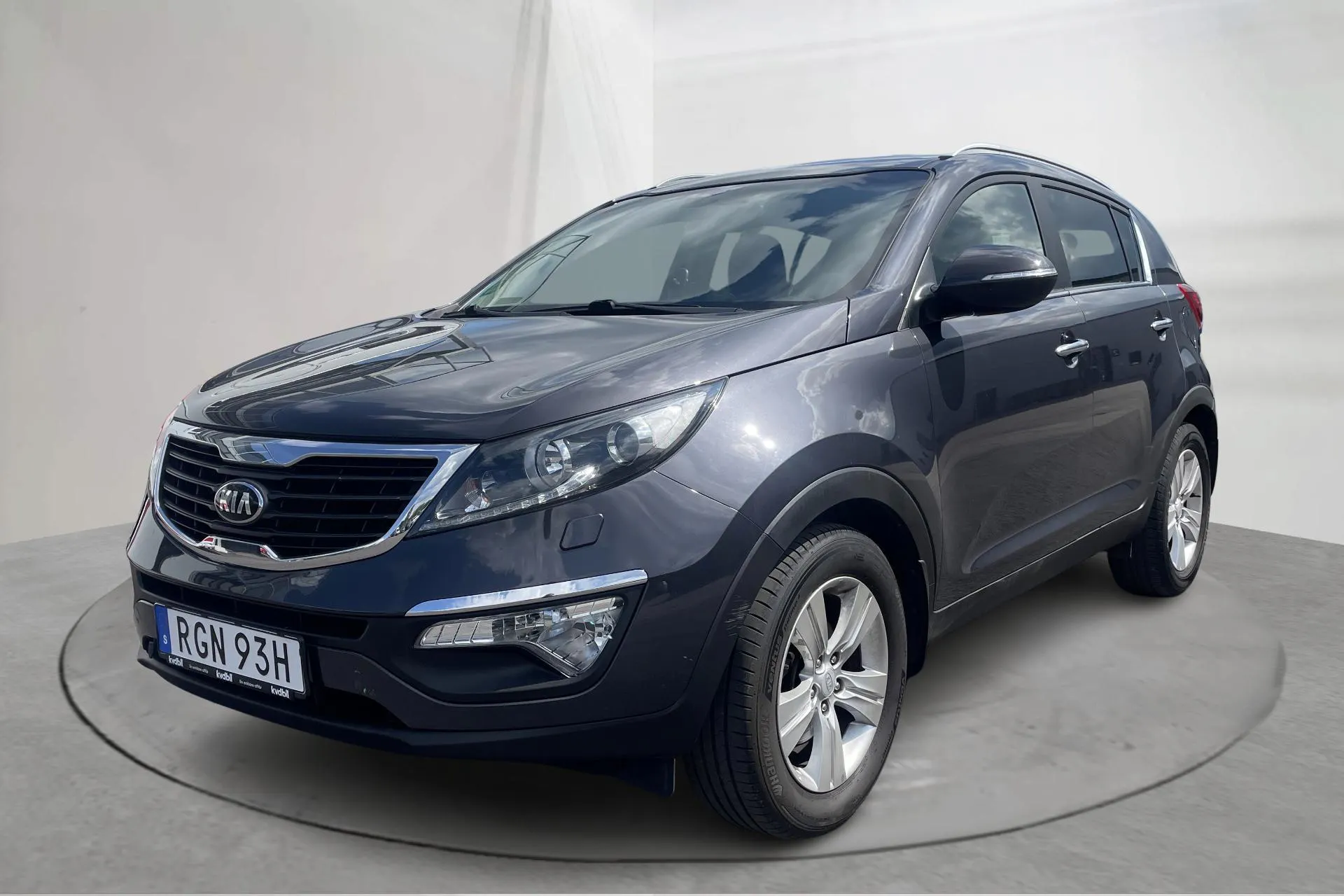Presentation photo 1 of 12: Kia Sportage 1.6 GDI (135hk) - 120 320 km - Manual - gray - 2013