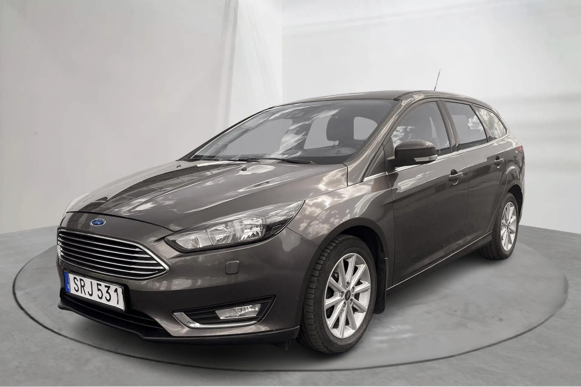 Presentationsfoto 1 av 13: Ford Focus 1.0 EcoBoost Kombi (125hk) - 13 777 mil - Automat - brun - 2016