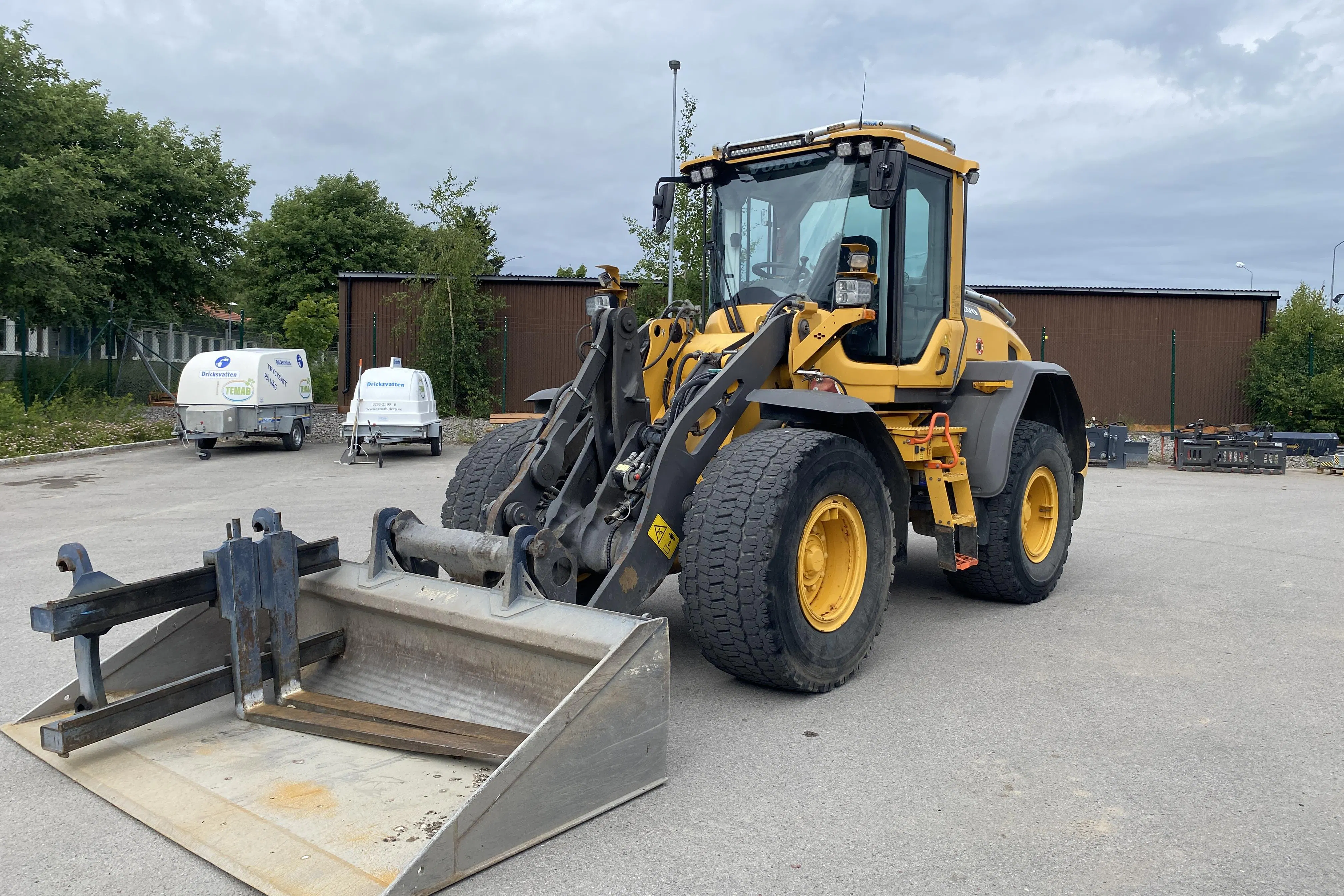 Presentationsfoto 1 av 47: VOLVO L60H hjullastare - 0 km - Automat - gul - 2019