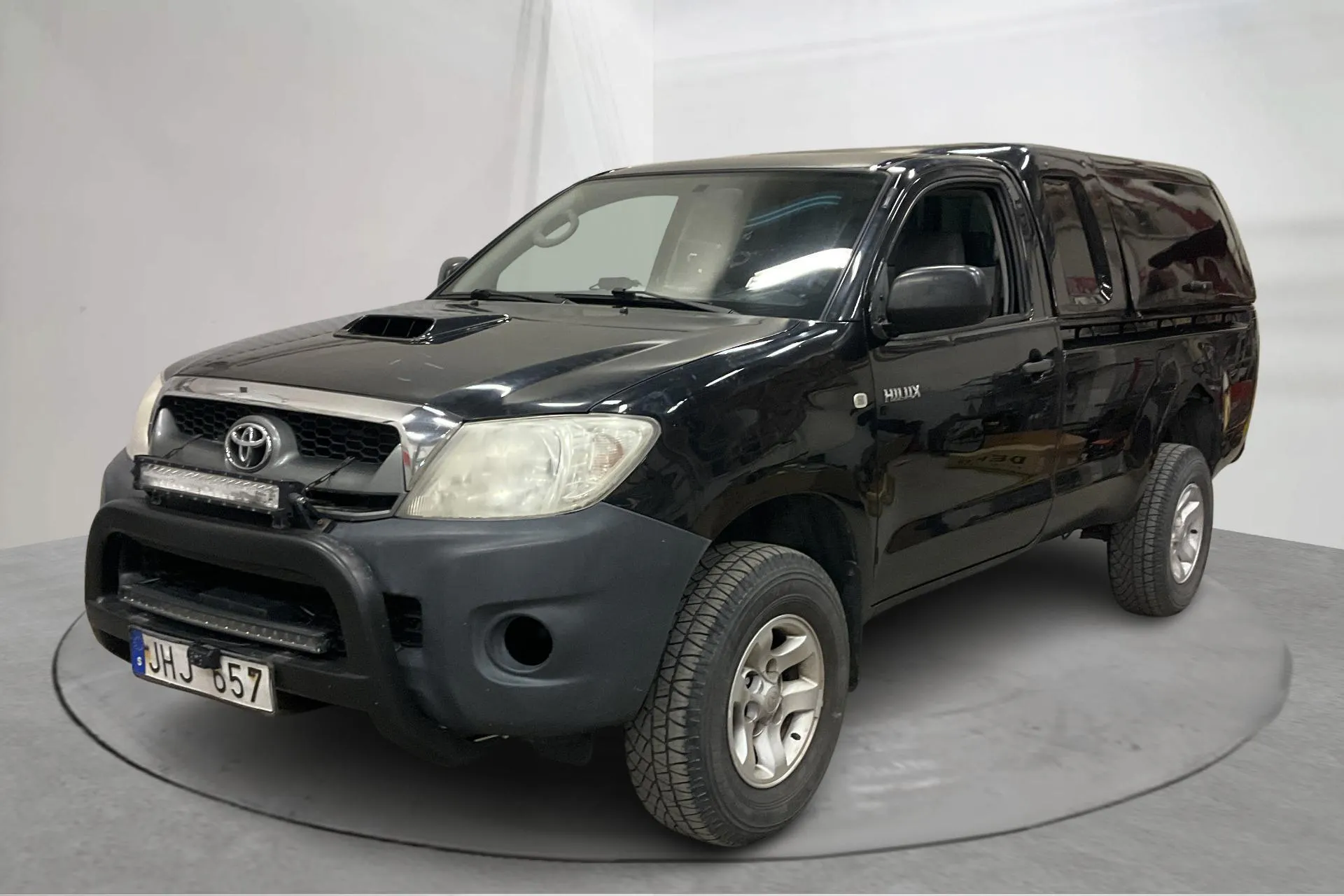 Presentation photo 1 of 19: Toyota Hilux 2.5 D-4D 4WD (144hk) - 22 831 Scandinavian mile - Manual - black - 2010