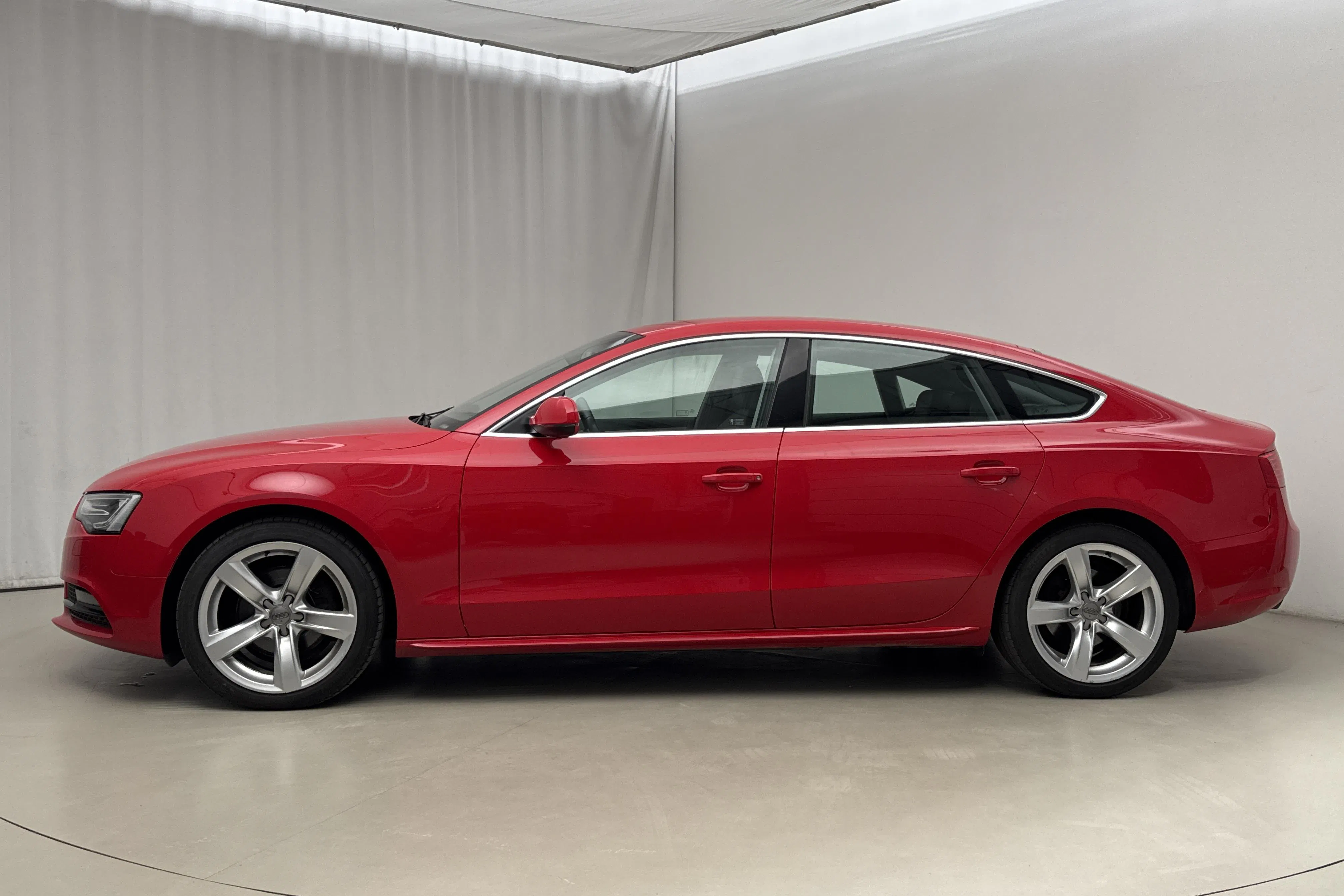 Presentation photo 2 of 15: Audi A5 2.0 TDI Sportback (177hk) - 163 540 km - Automatic - red - 2013
