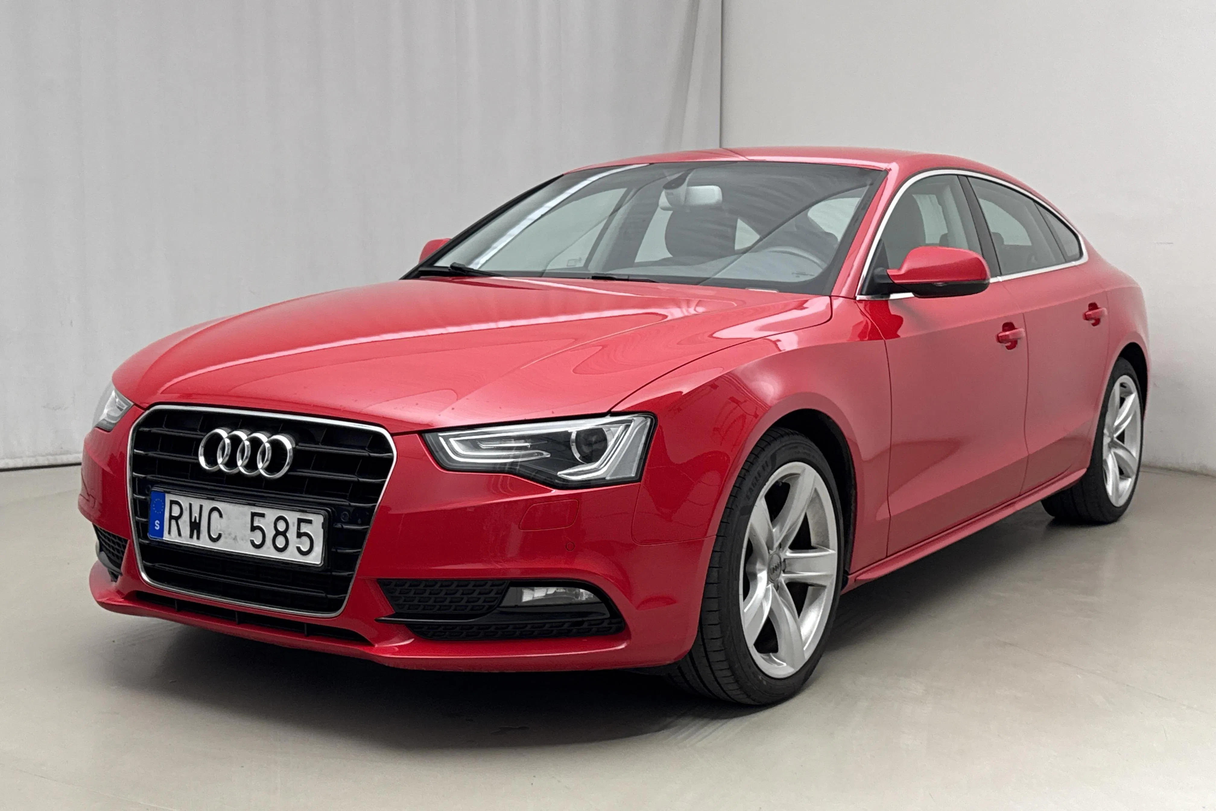 Presentation photo 1 of 15: Audi A5 2.0 TDI Sportback (177hk) - 163 540 km - Automatic - red - 2013