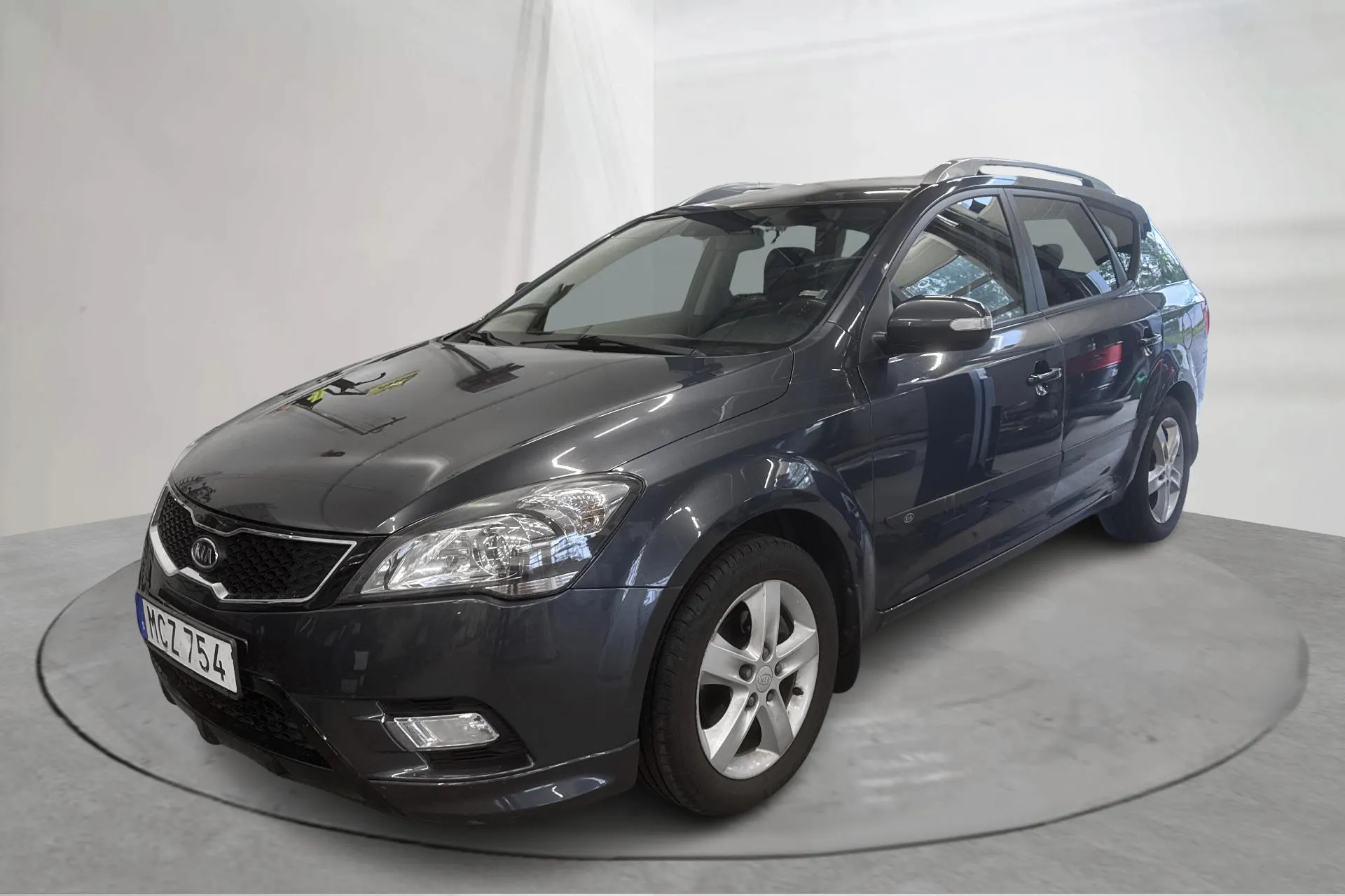 Presentation photo 1 of 12: KIA Cee'd 1.6 CRDi SW (128hk) - 161 600 km - Manual - gray - 2012