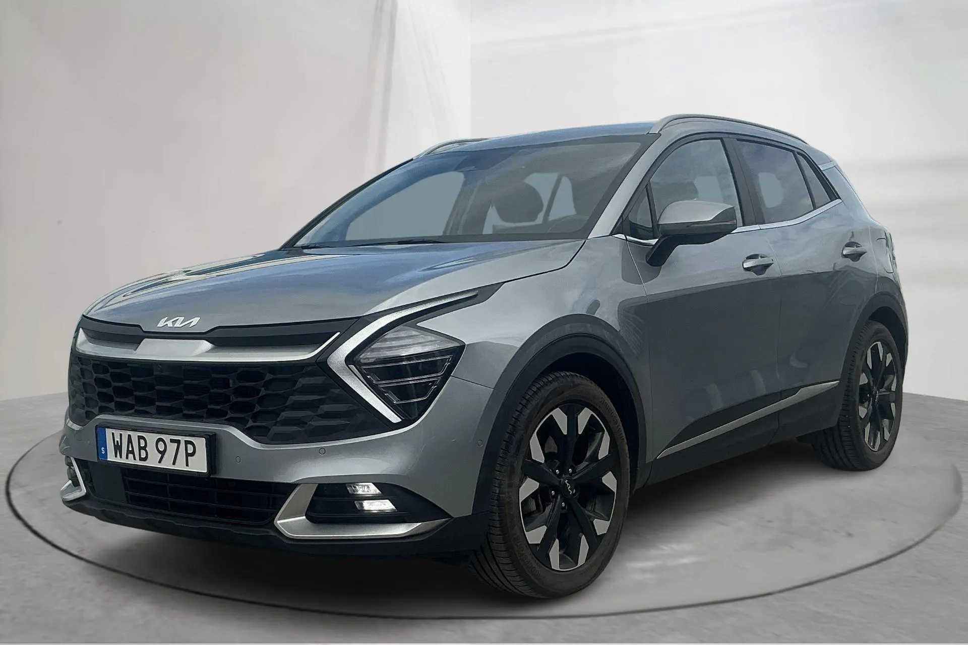 Presentationsfoto 1 av 14: KIA Sportage PHEV AWD (265hk) - 9 362 mil - Automat - grå - 2022