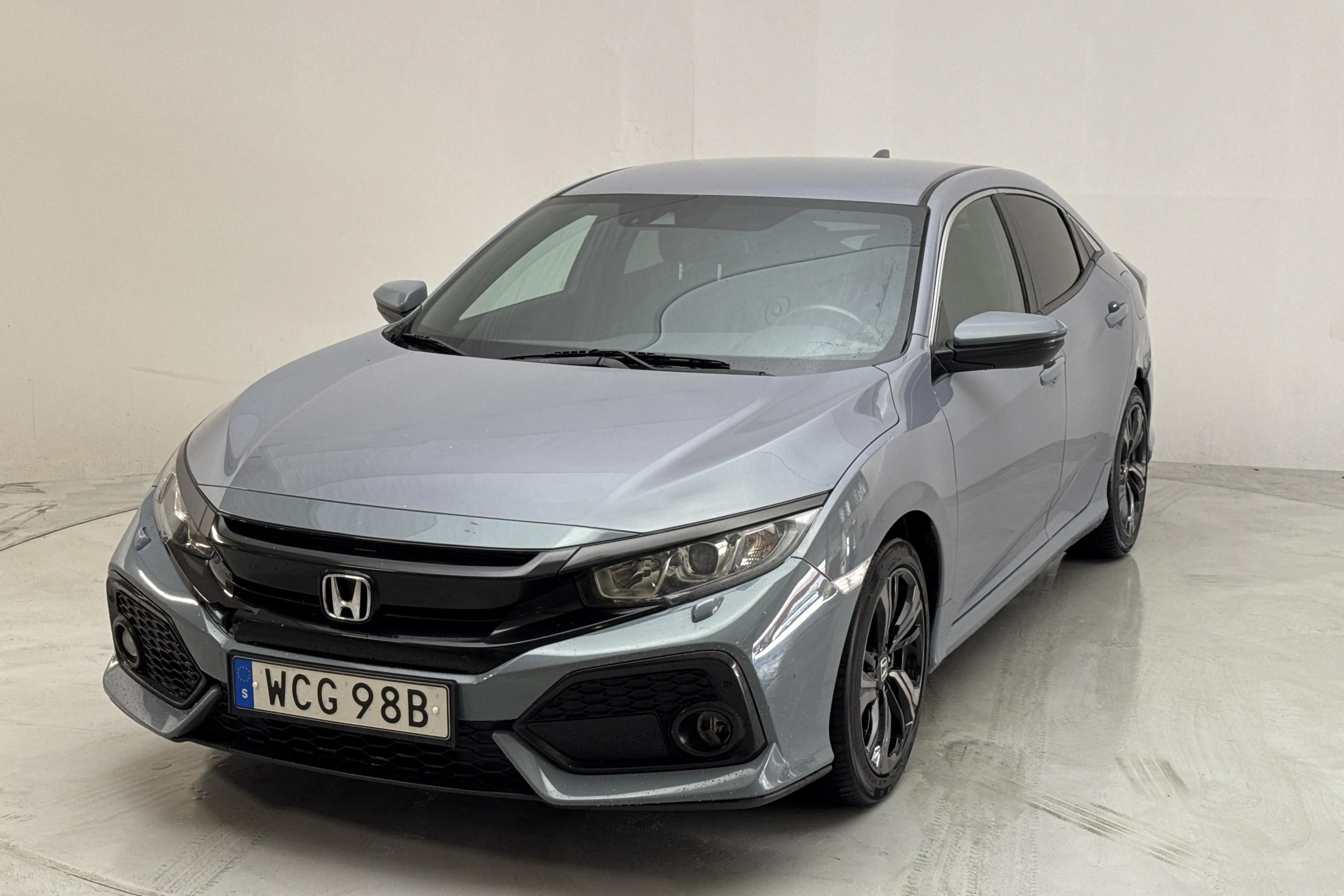 Presentationsfoto 1 av 13: Honda Civic 1.0 i-VTEC 5dr (126hk) - 13 753 mil - Manuell - Mörkgrå - 2018