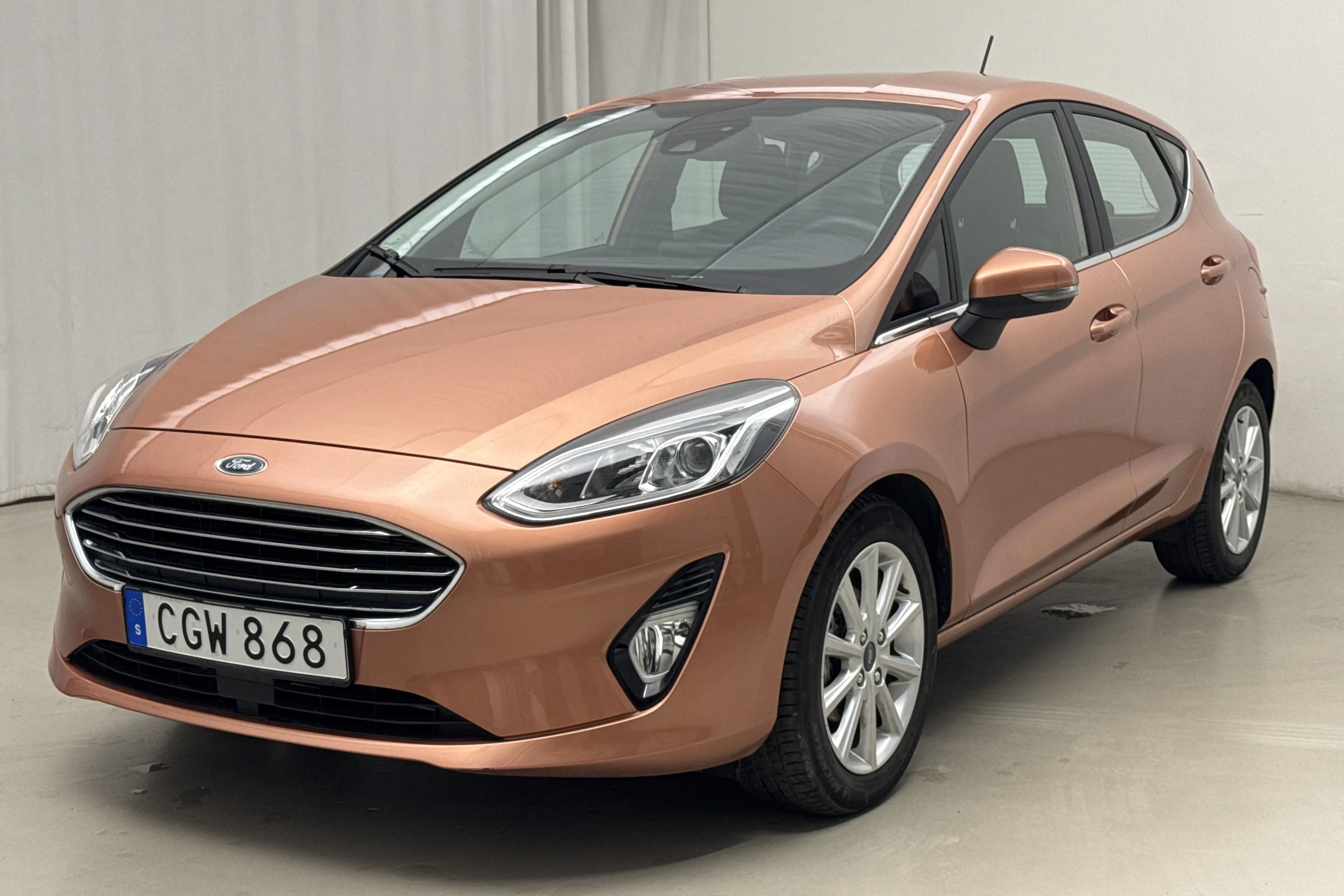 Presentation photo 1 of 18: Ford Fiesta 1.0T EcoBoost 5dr (100hk) - 702 Scandinavian mile - Automatic - orange - 2019