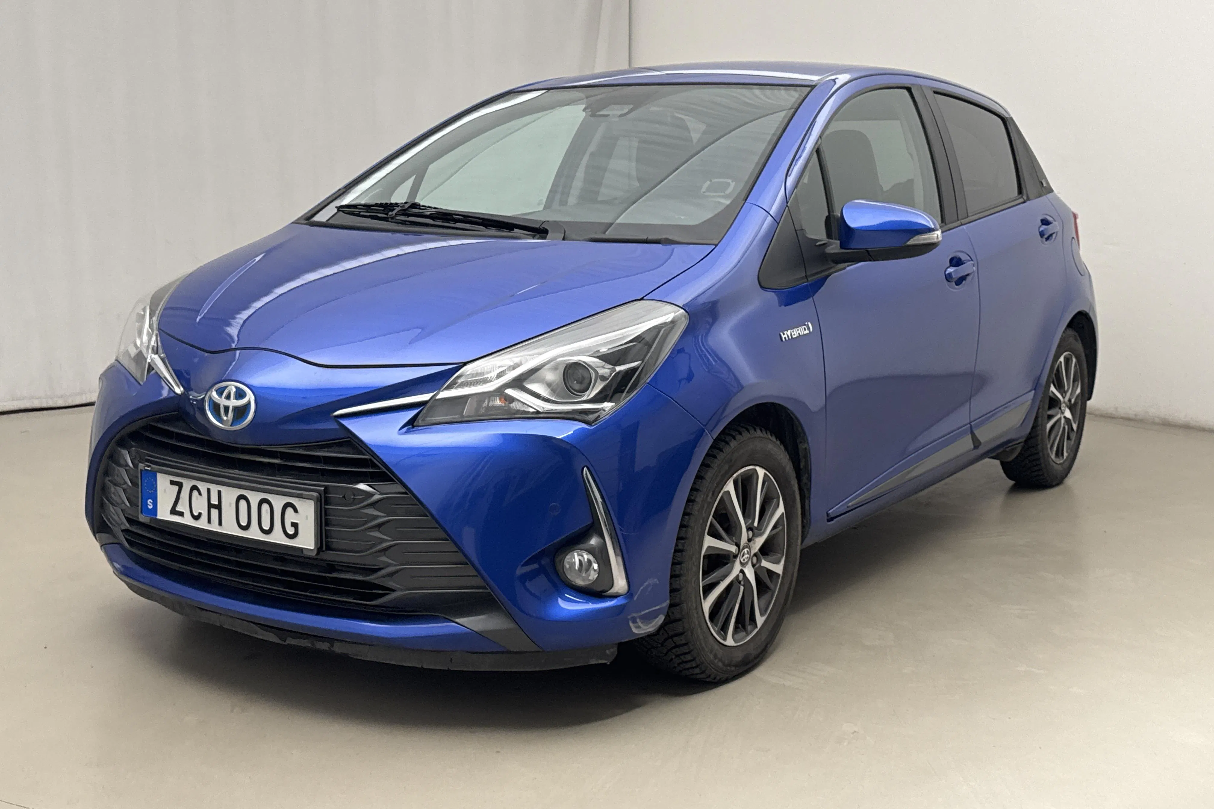 Presentationsfoto 1 av 17: Toyota Yaris 1.5 Hybrid 5dr (101hk) - 7 471 mil - Automat - blå - 2019