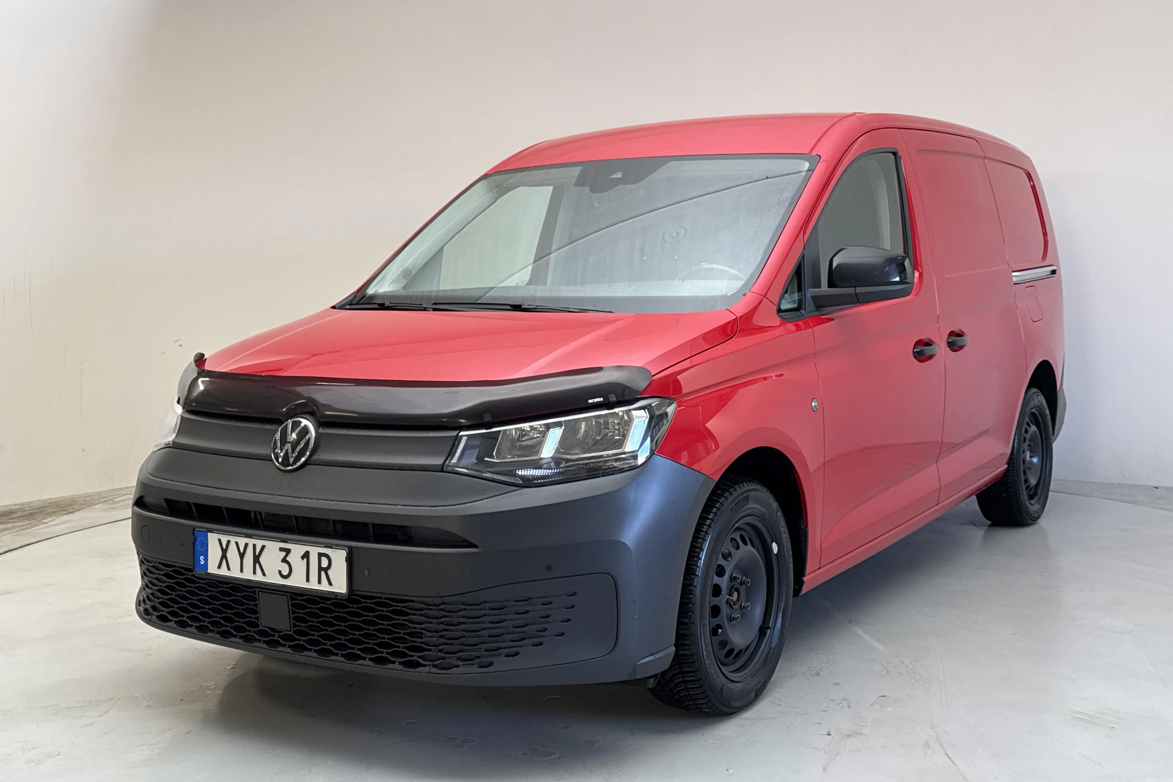 Presentationsfoto 1 av 14: VW Caddy Cargo Maxi 2.0 TDI (122hk) - 14 162 mil - Automat - röd - 2023