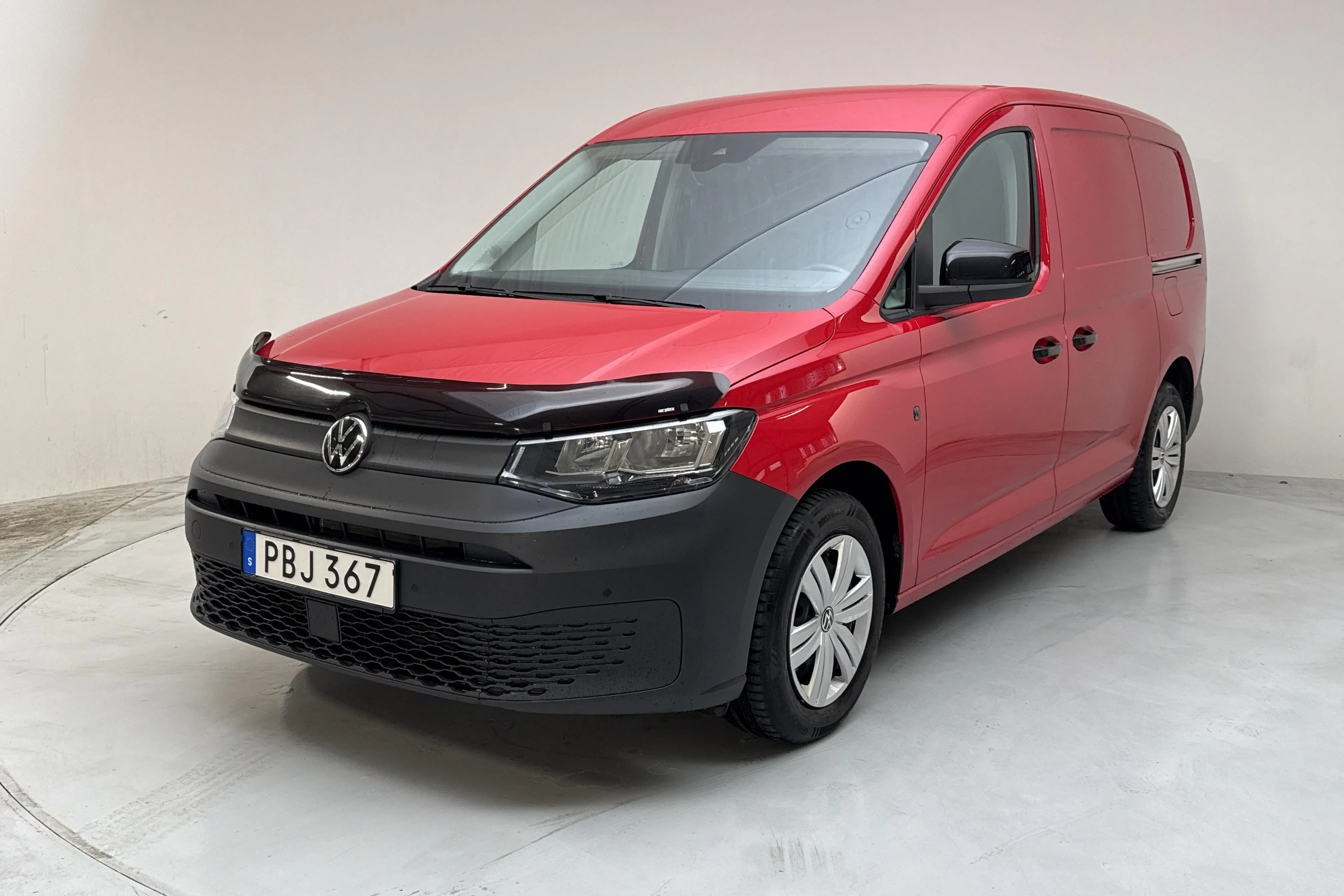 Presentationsfoto 1 av 13: VW Caddy Cargo Maxi 2.0 TDI (122hk) - 9 276 mil - Automat - röd - 2023