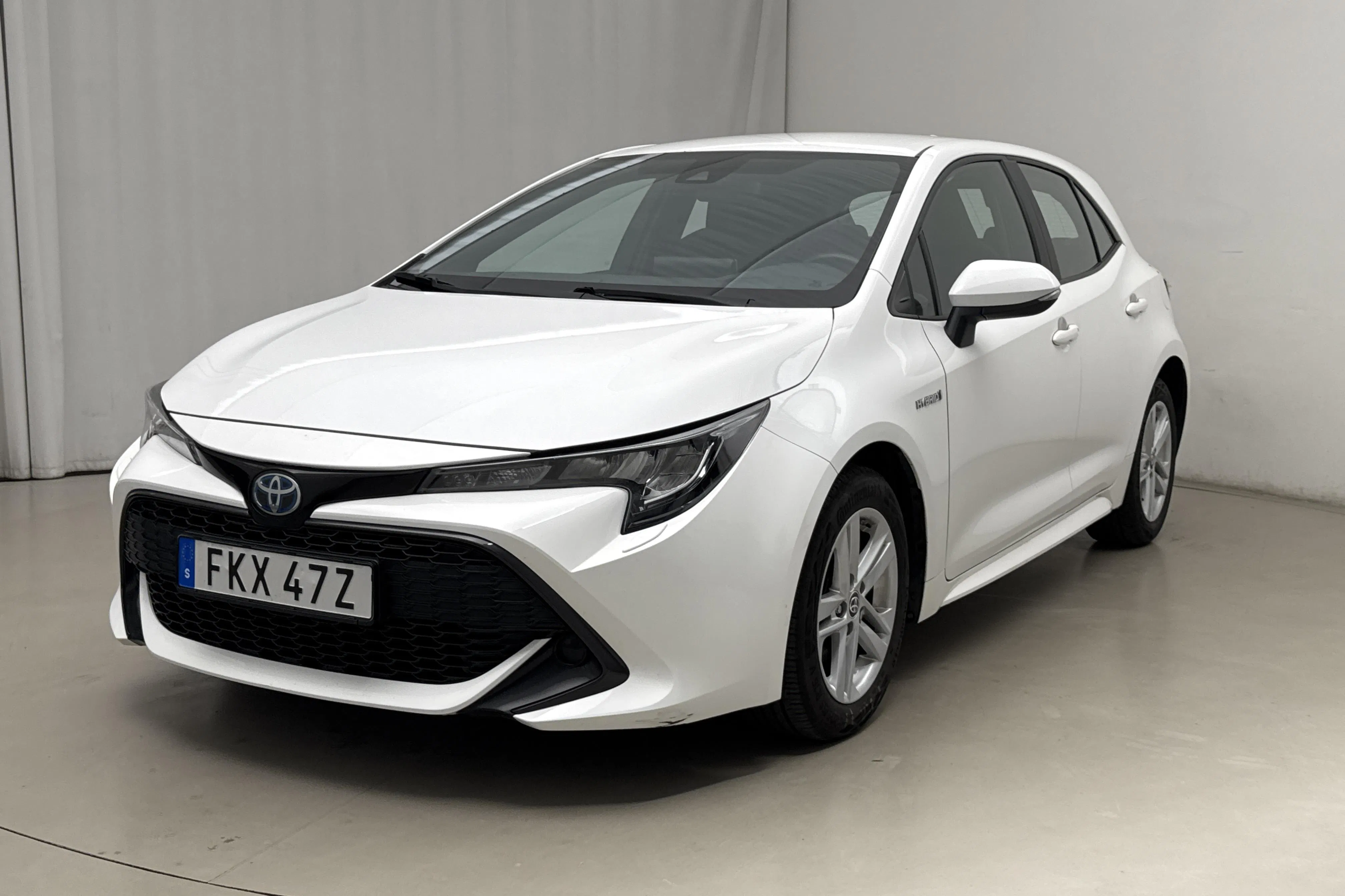 Presentation photo 1 of 16: Toyota Corolla 1.8 Hybrid 5dr (122hk) - 59 200 km - Automatic - white - 2022