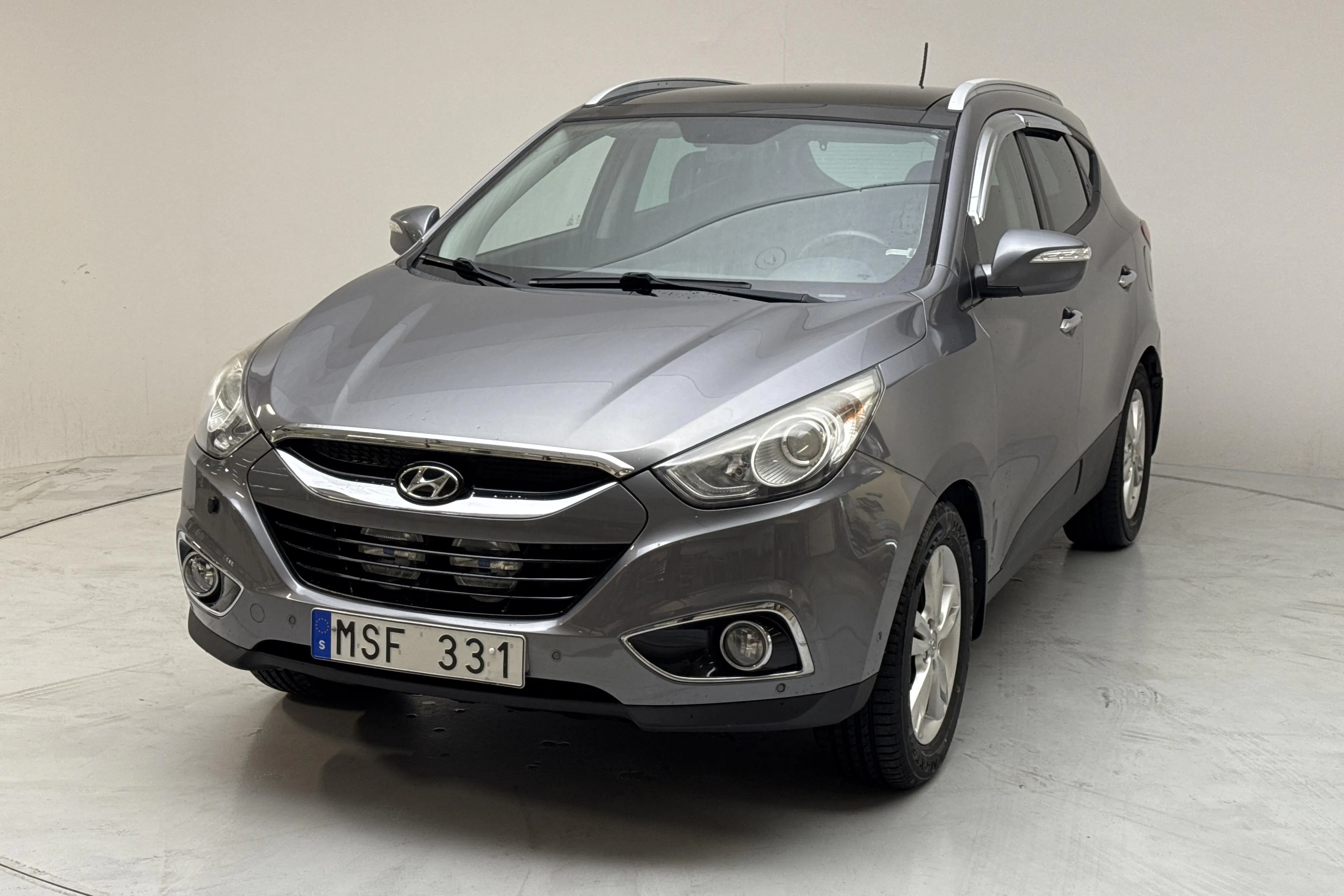 Presentationsfoto 1 av 15: Hyundai ix35 2.0 CRDi-R 4WD (184hk) - 21 004 mil - Automat - grå - 2012