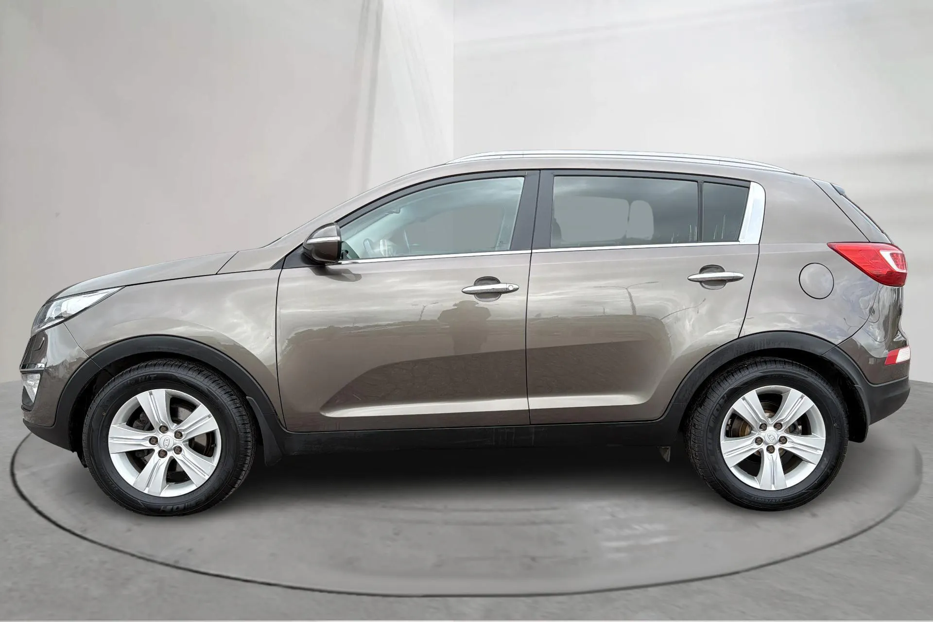 Presentation photo 2 of 14: KIA Sportage 2.0 CRDi AWD (184hk) - 25 027 Scandinavian mile - Automatic - light brown - 2012