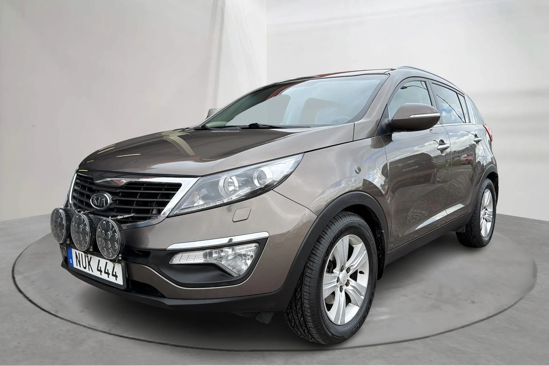 Presentation photo 1 of 14: KIA Sportage 2.0 CRDi AWD (184hk) - 25 027 Scandinavian mile - Automatic - light brown - 2012