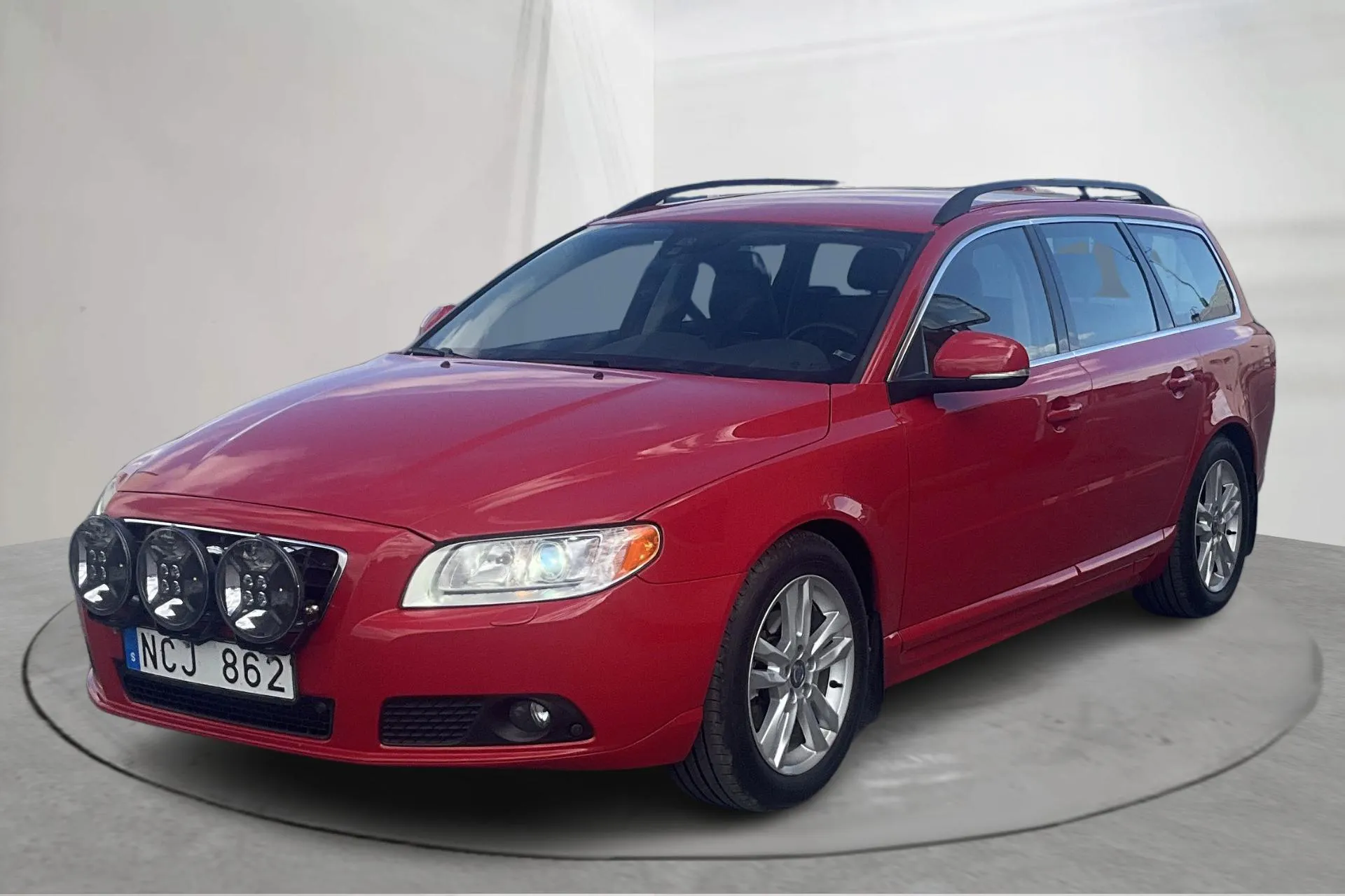 Presentationsfoto 1 av 14: Volvo V70 II D4 (163hk) - 19 780 mil - Manuell - röd - 2013