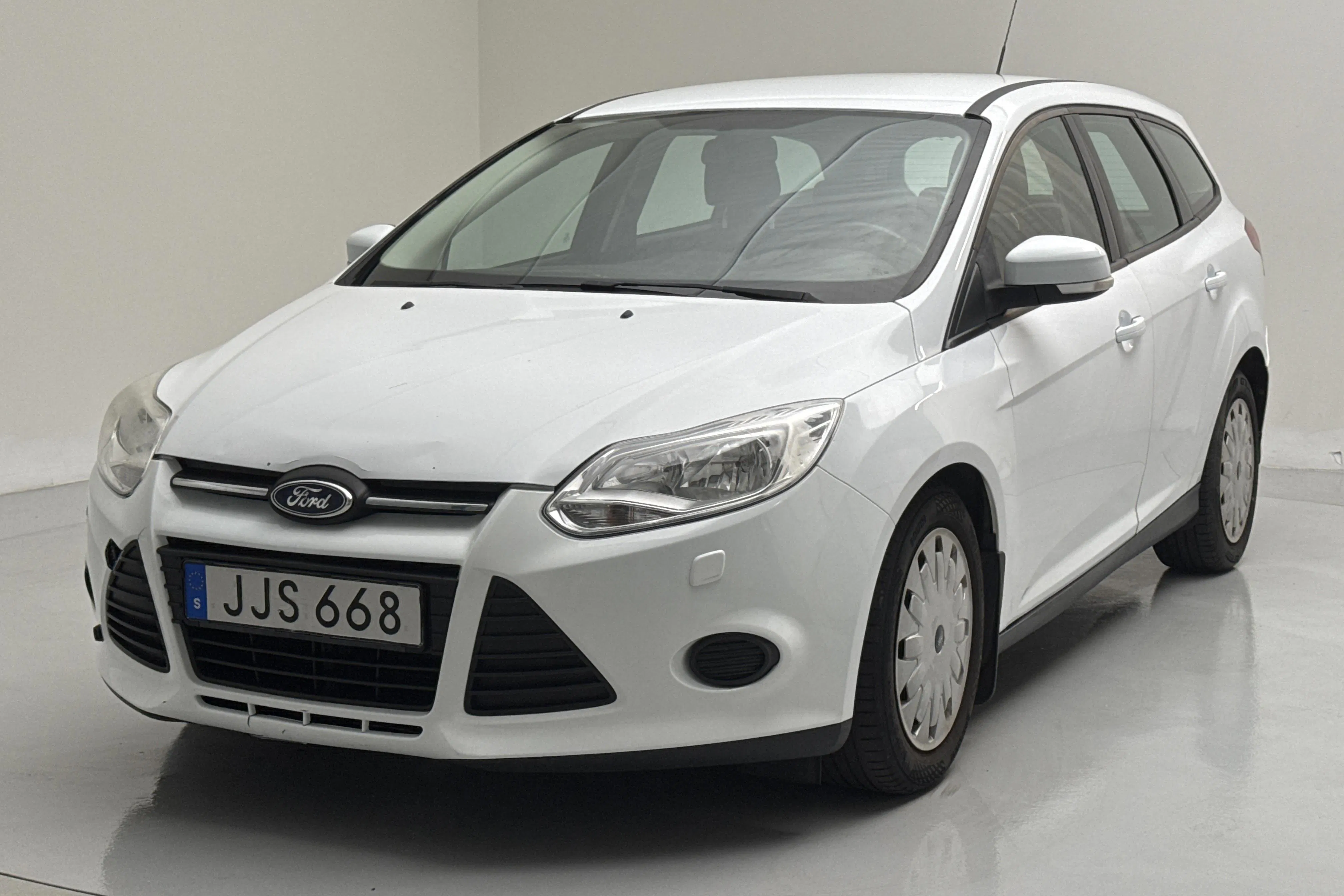 Presentationsfoto 1 av 12: Ford Focus 1.6 TDCi ECOnetic Kombi (105hk) - 18 997 mil - Manuell - vit - 2014