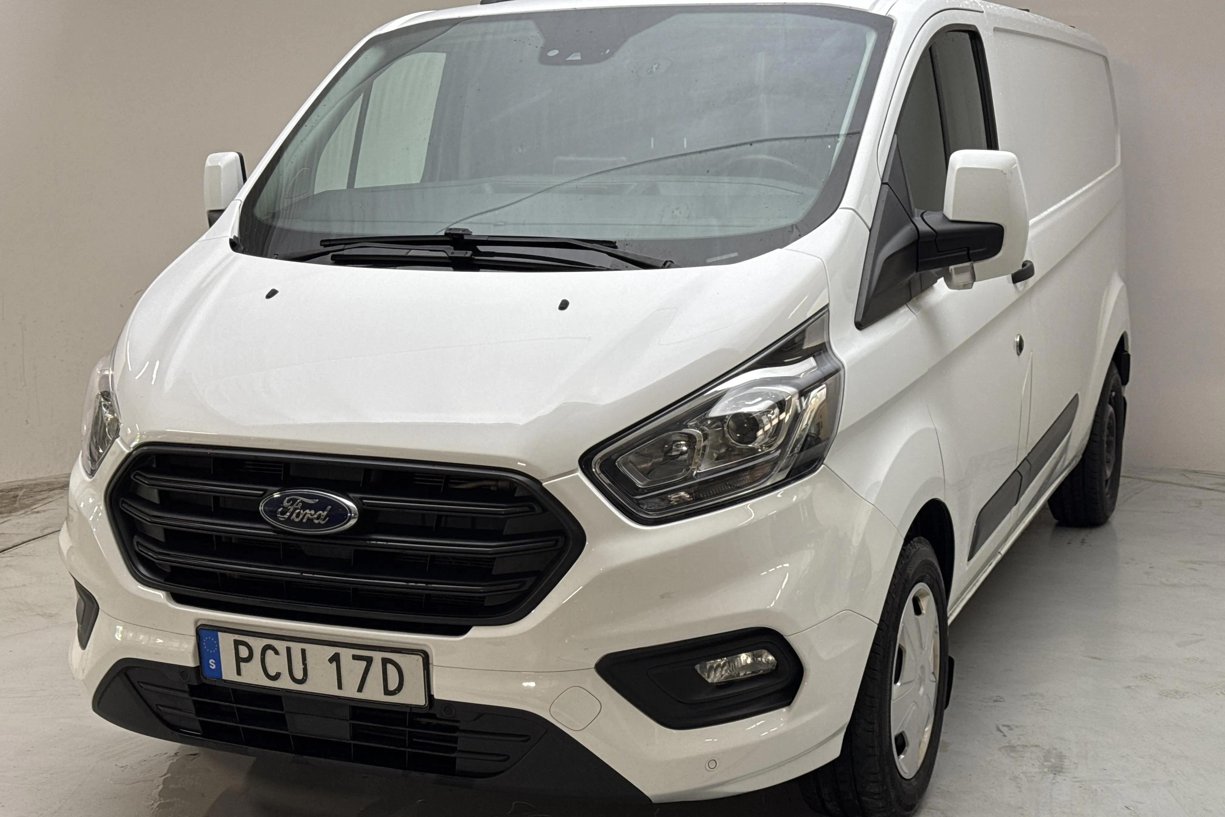 Presentation photo 1 of 11: Ford Transit Custom 300 (130hk) - 171 750 km - Automatic - white - 2023