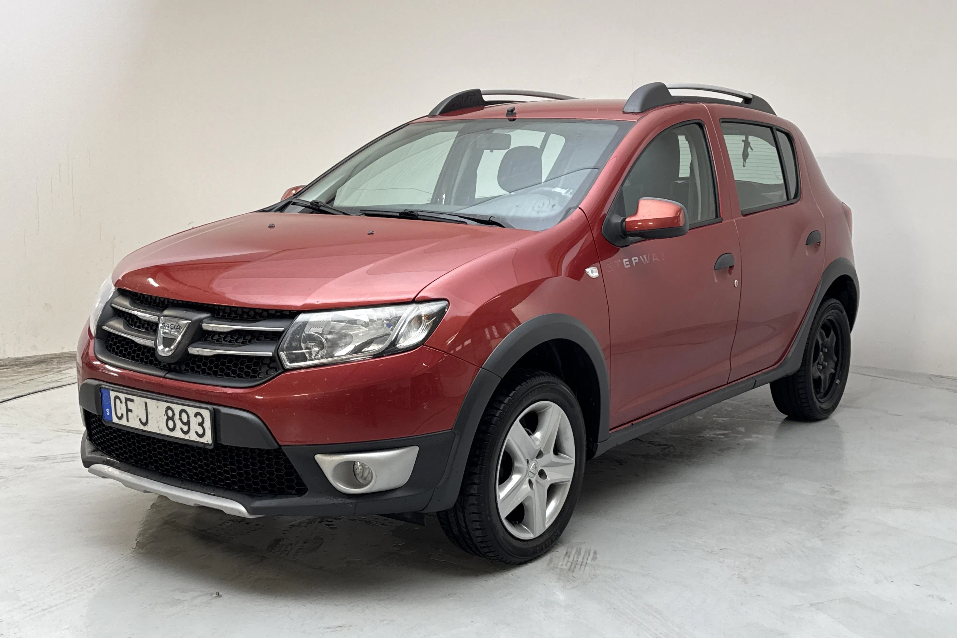 Presentation photo 1 of 11: Dacia Sandero 0.9 TCe Stepway (90hk) - 146 580 km - Manual - red - 2014