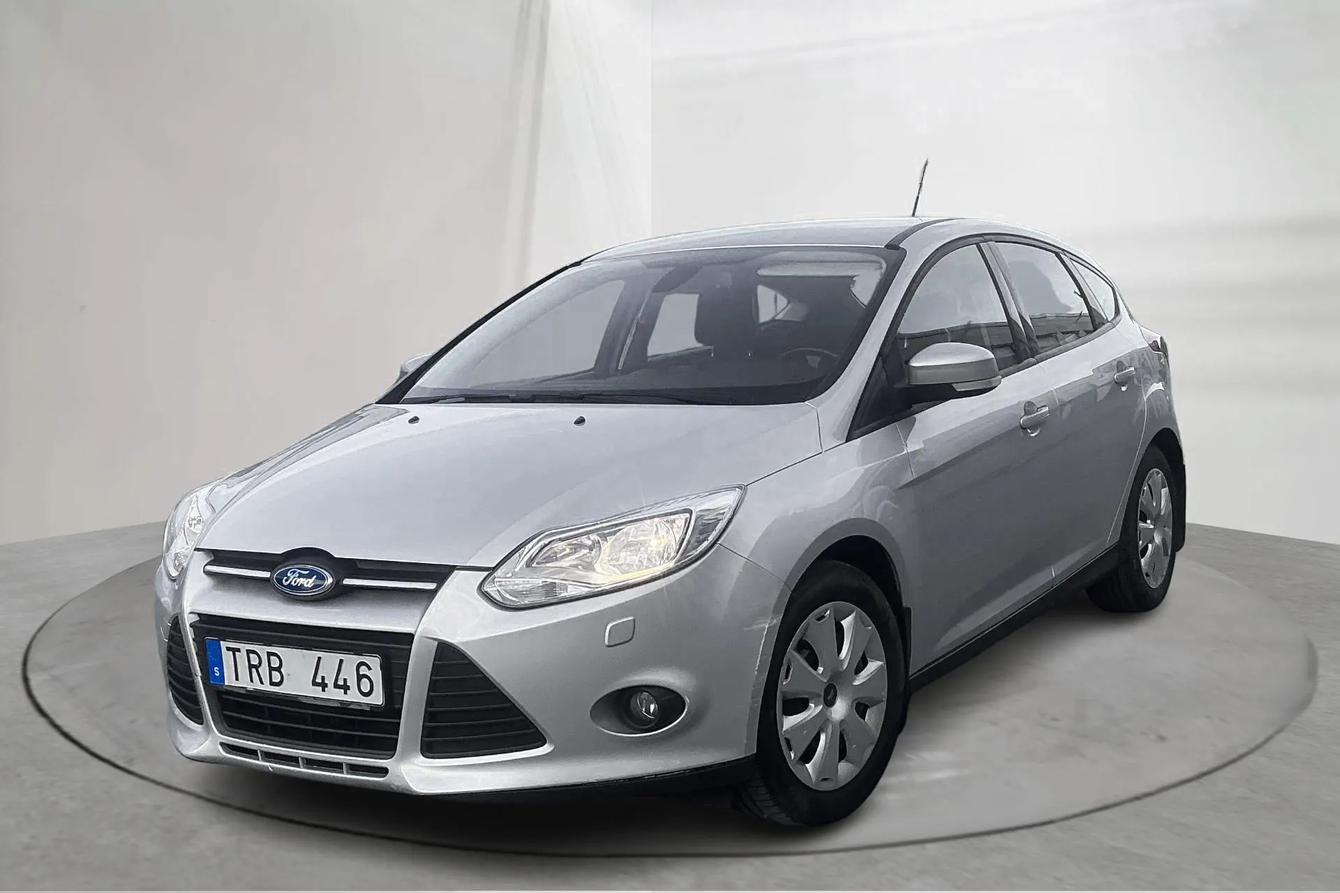 Presentationsfoto 1 av 13: Ford Focus 1.6 Ti-VCT Flexifuel 5dr (120hk) - 9 840 mil - Manuell - grå - 2013