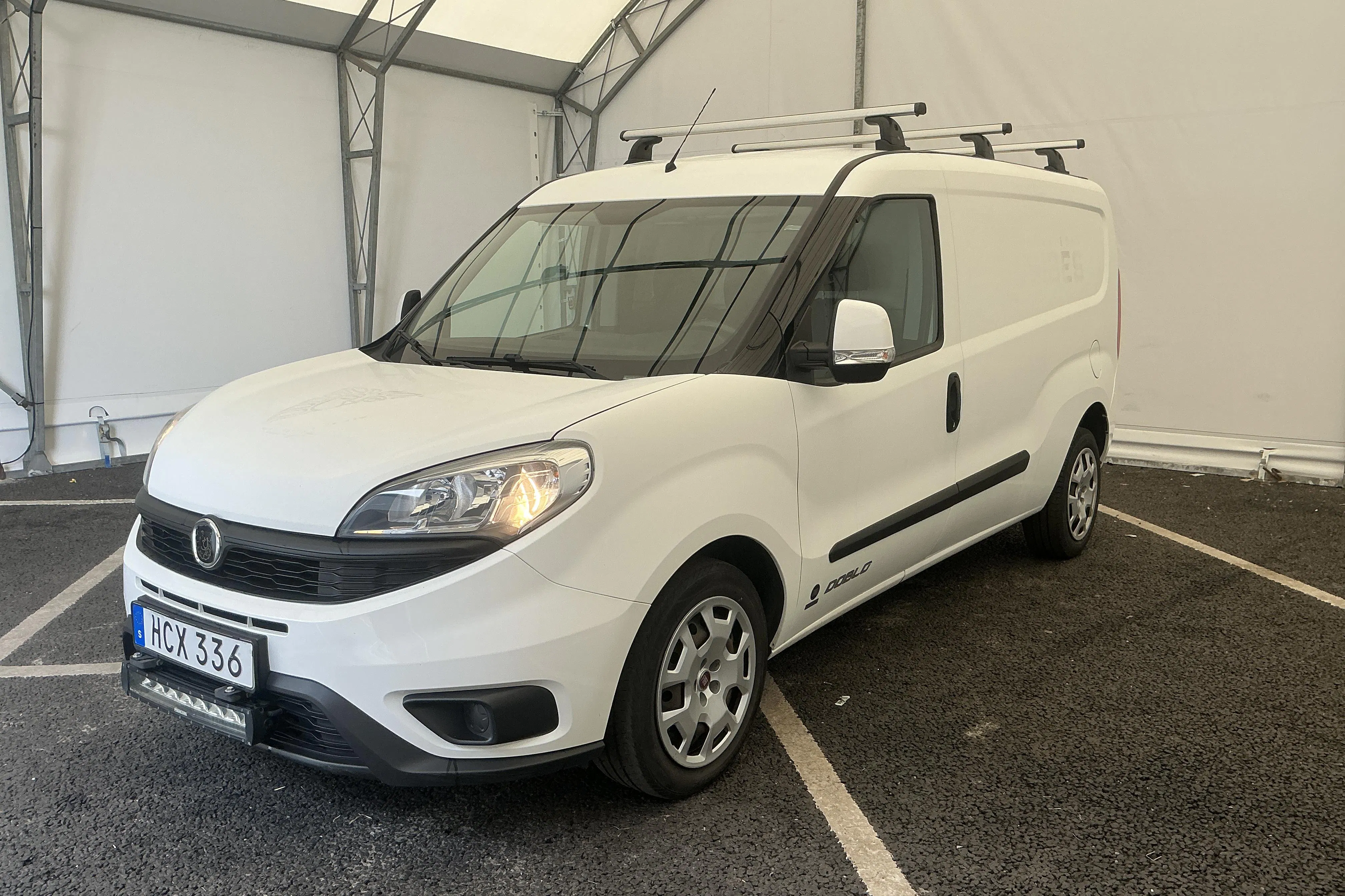 Presentationsfoto 1 av 18: Fiat Doblo Cargo 1.3 MJT (95hk) - 7 573 mil - Manuell - vit - 2017