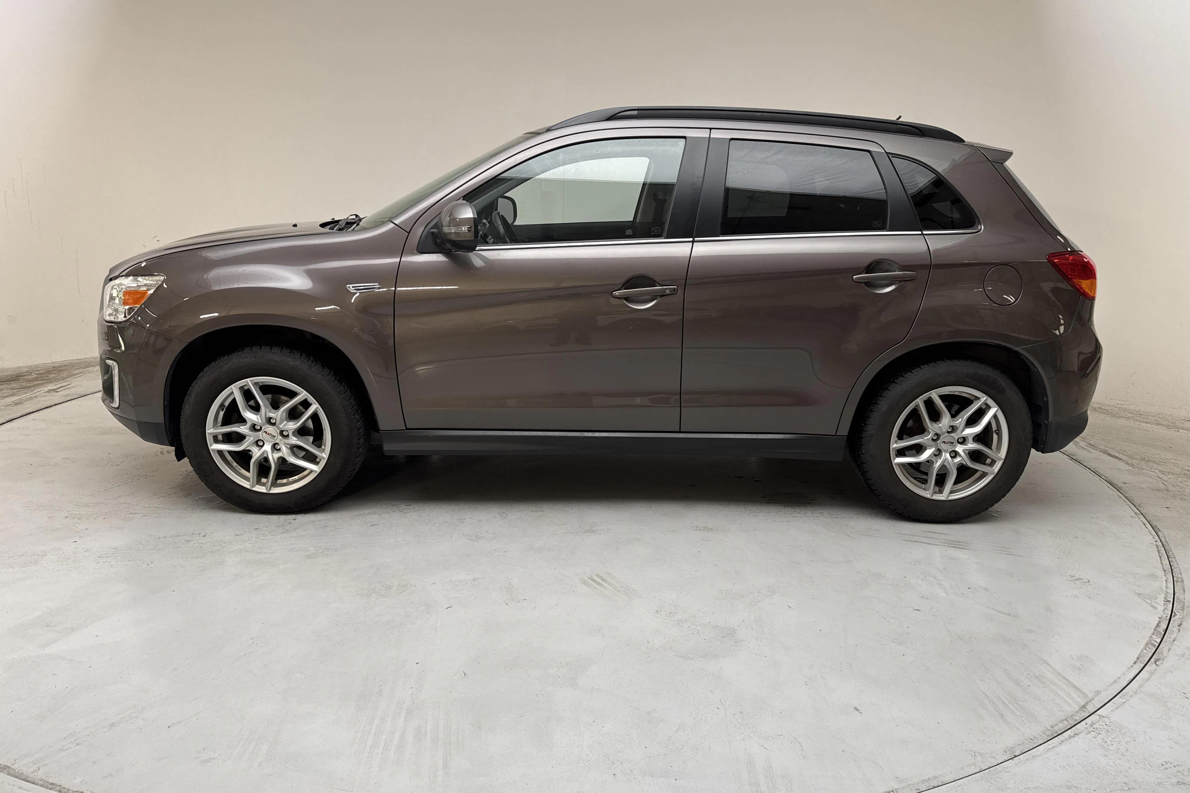 Presentationsfoto 2 av 14: Mitsubishi ASX 2.2D 4WD (150hk) - 16 874 mil - Automat - brun - 2015