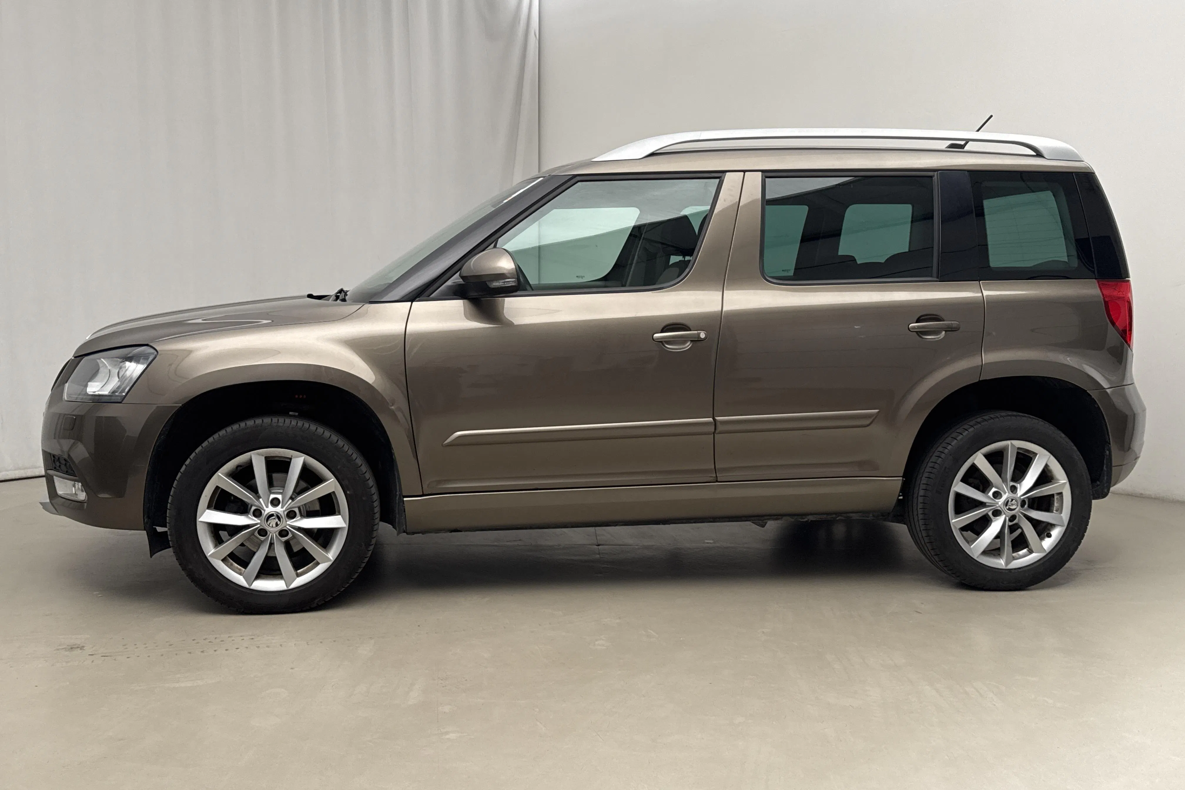 Presentation photo 2 of 17: Skoda Yeti 1.4 TSI Green Tec (122hk) - 178 170 km - Automatic - brown - 2015