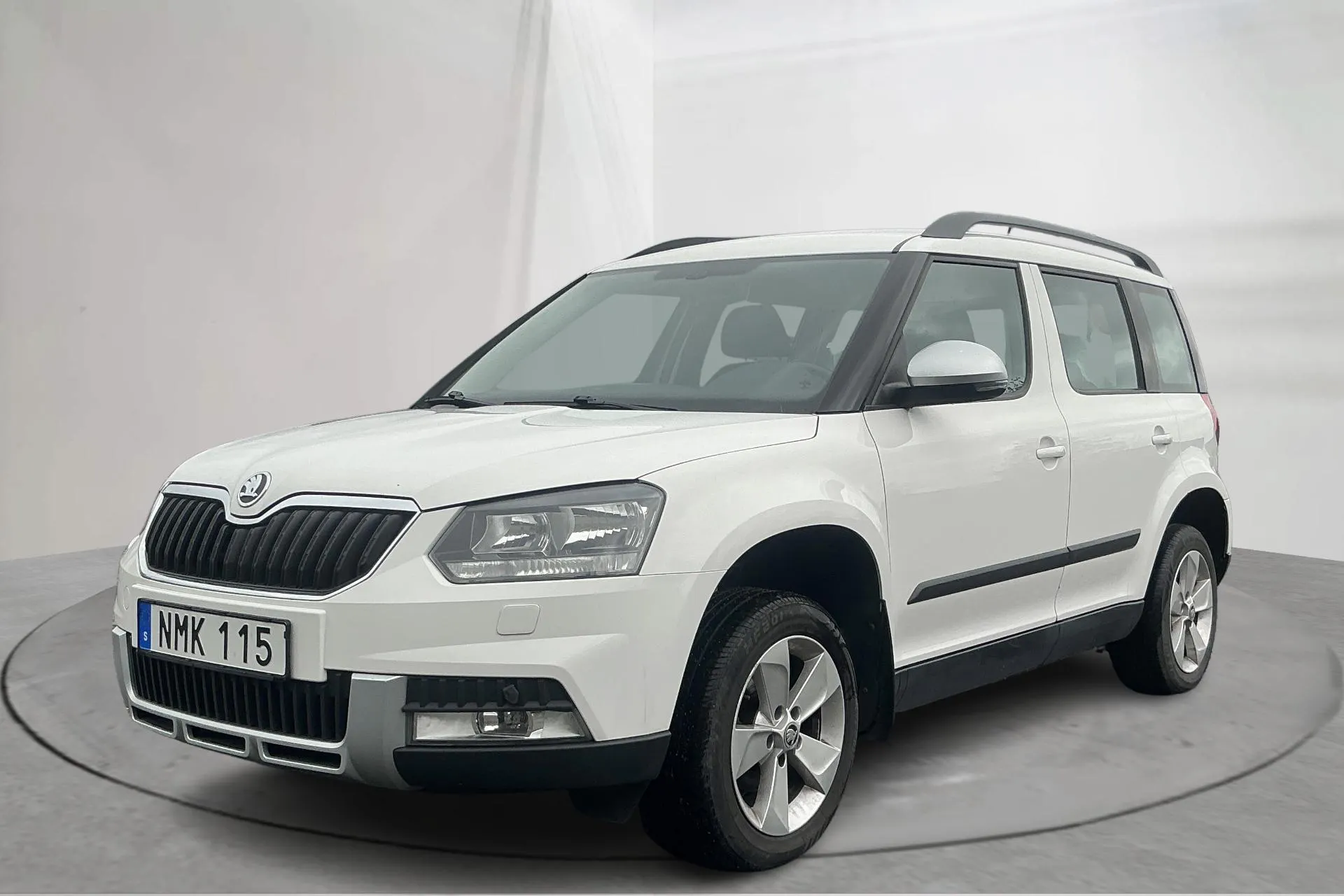 Presentation photo 1 of 14: Skoda Yeti 2.0 TDI 4X4 (110hk) - 101 400 km - Manual - white - 2014