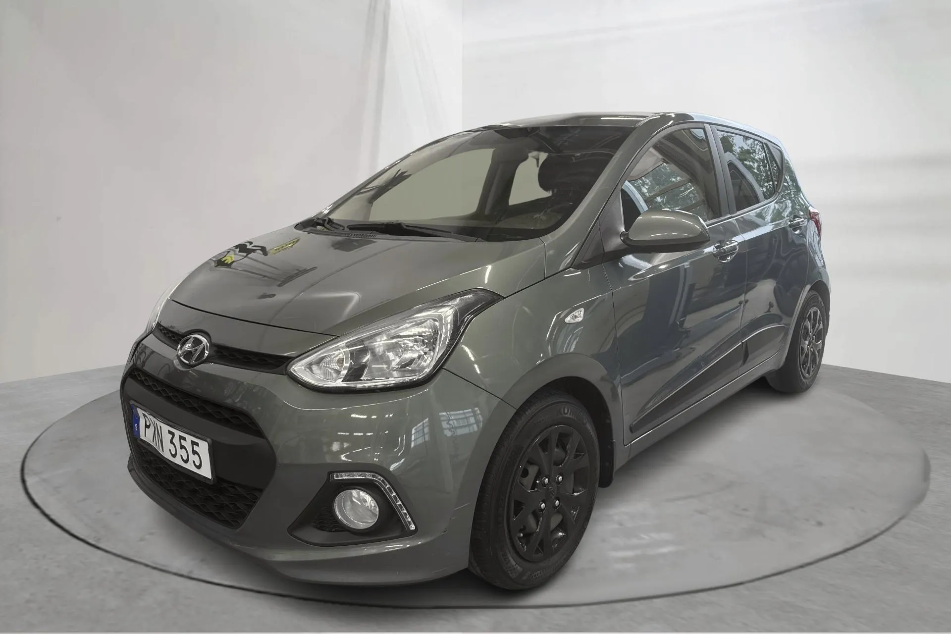 Presentationsfoto 1 av 12: Hyundai i10 1.0 (66hk) - 10 869 mil - Manuell - blå - 2016
