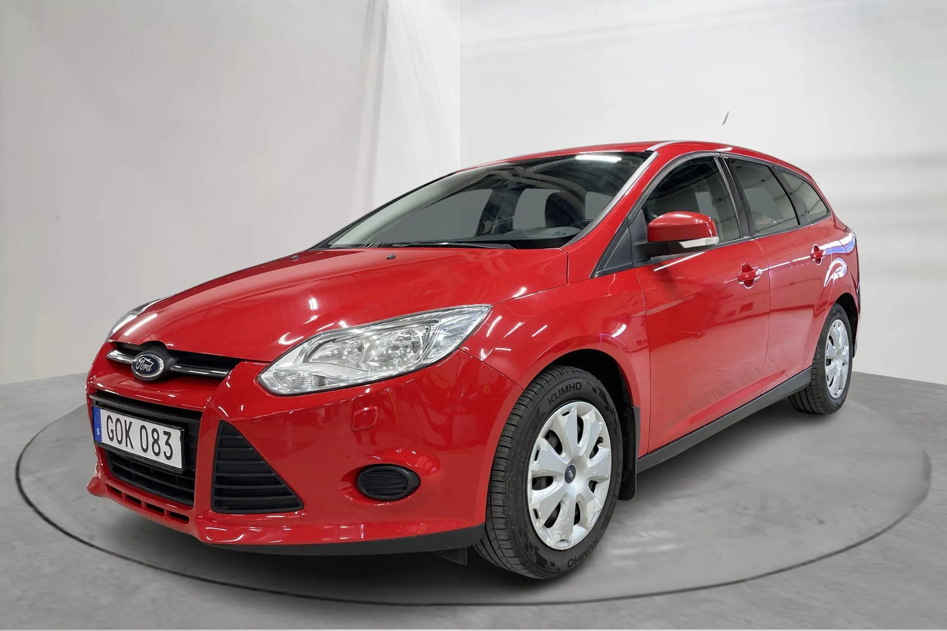 Presentation photo 1 of 13: Ford Focus 1.6 Ti-VCT Flexifuel Kombi (120hk) - 169 470 km - Manual - red - 2013