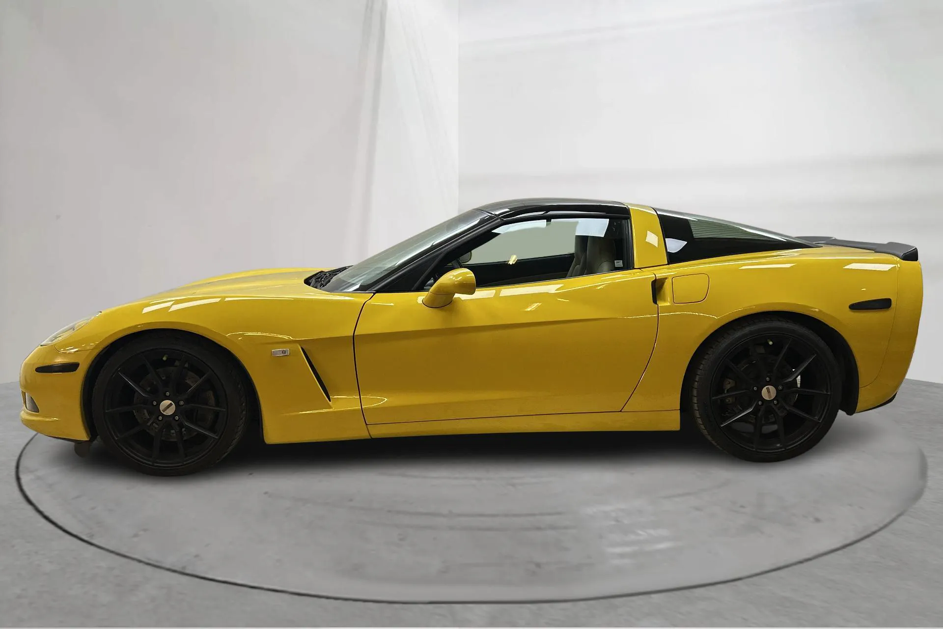 Presentation photo 2 of 16: Chevrolet Corvette C6 6.0 Targa (405hk) - 115 520 km - Automatic - yellow - 2006