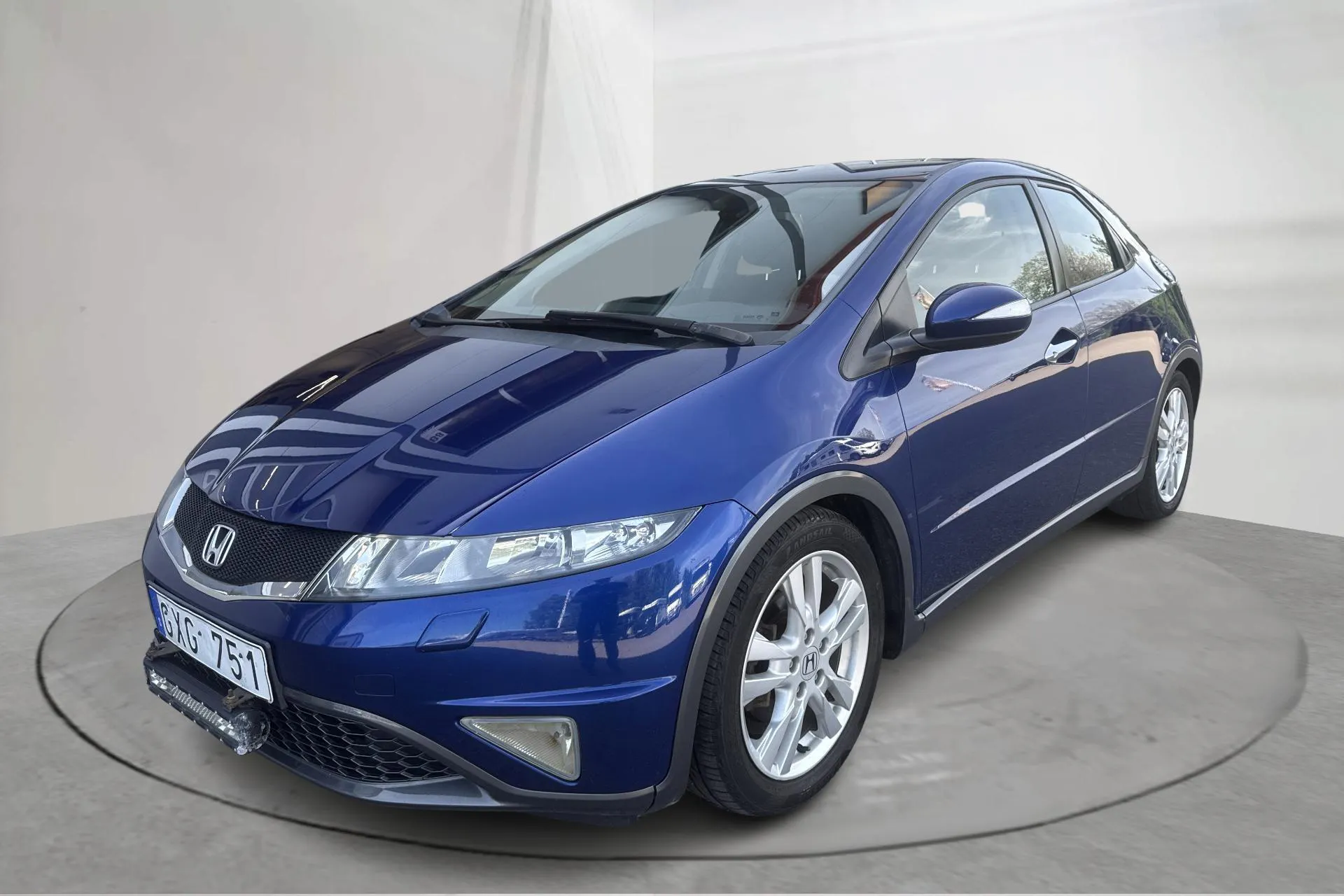 Presentationsfoto 1 av 14: Honda Civic 1.8 5dr (140hk) - 17 489 mil - Manuell - Mörkblå - 2010