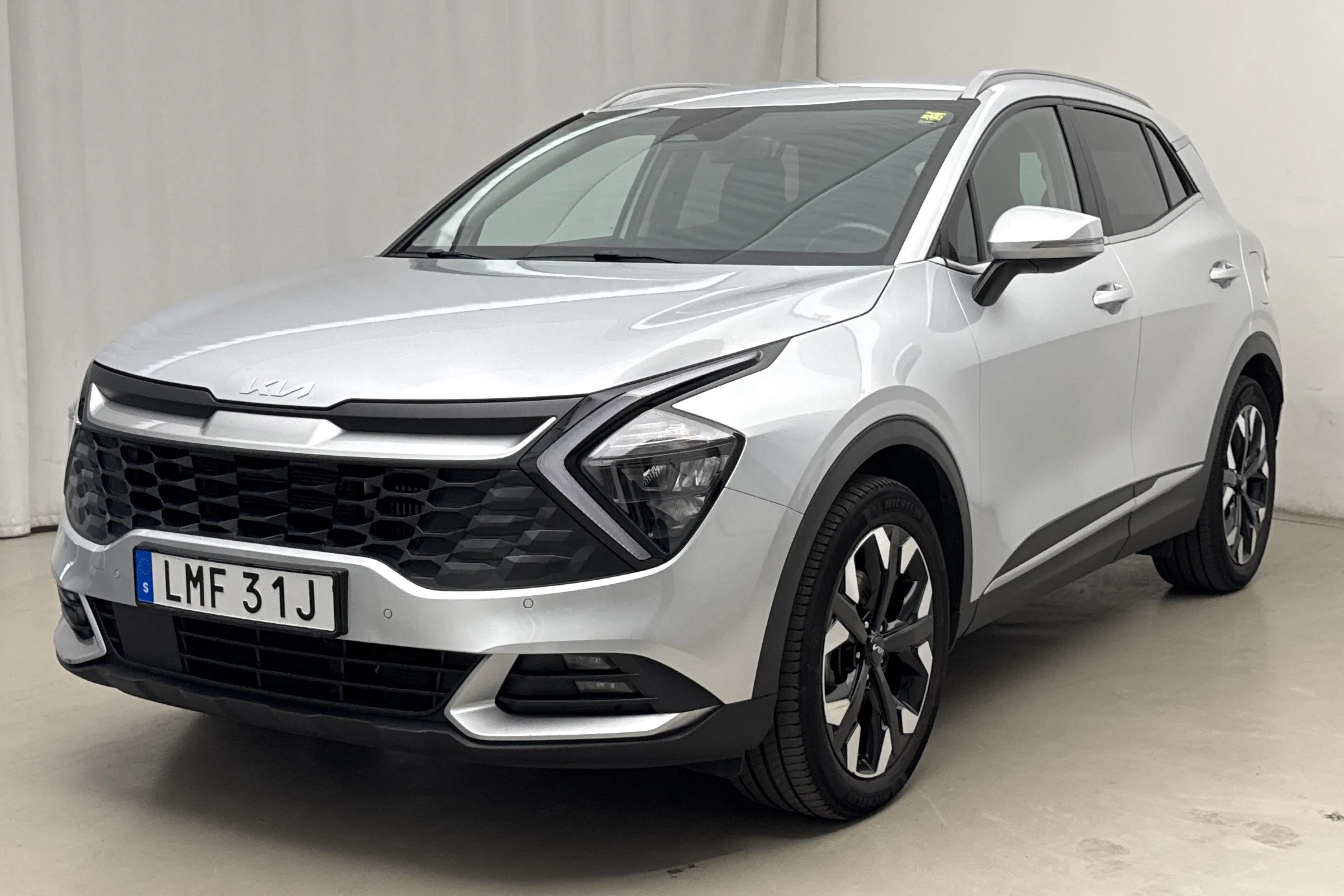 Presentationsfoto 1 av 20: KIA Sportage PHEV AWD (265hk) - 10 396 mil - Automat - grå - 2022