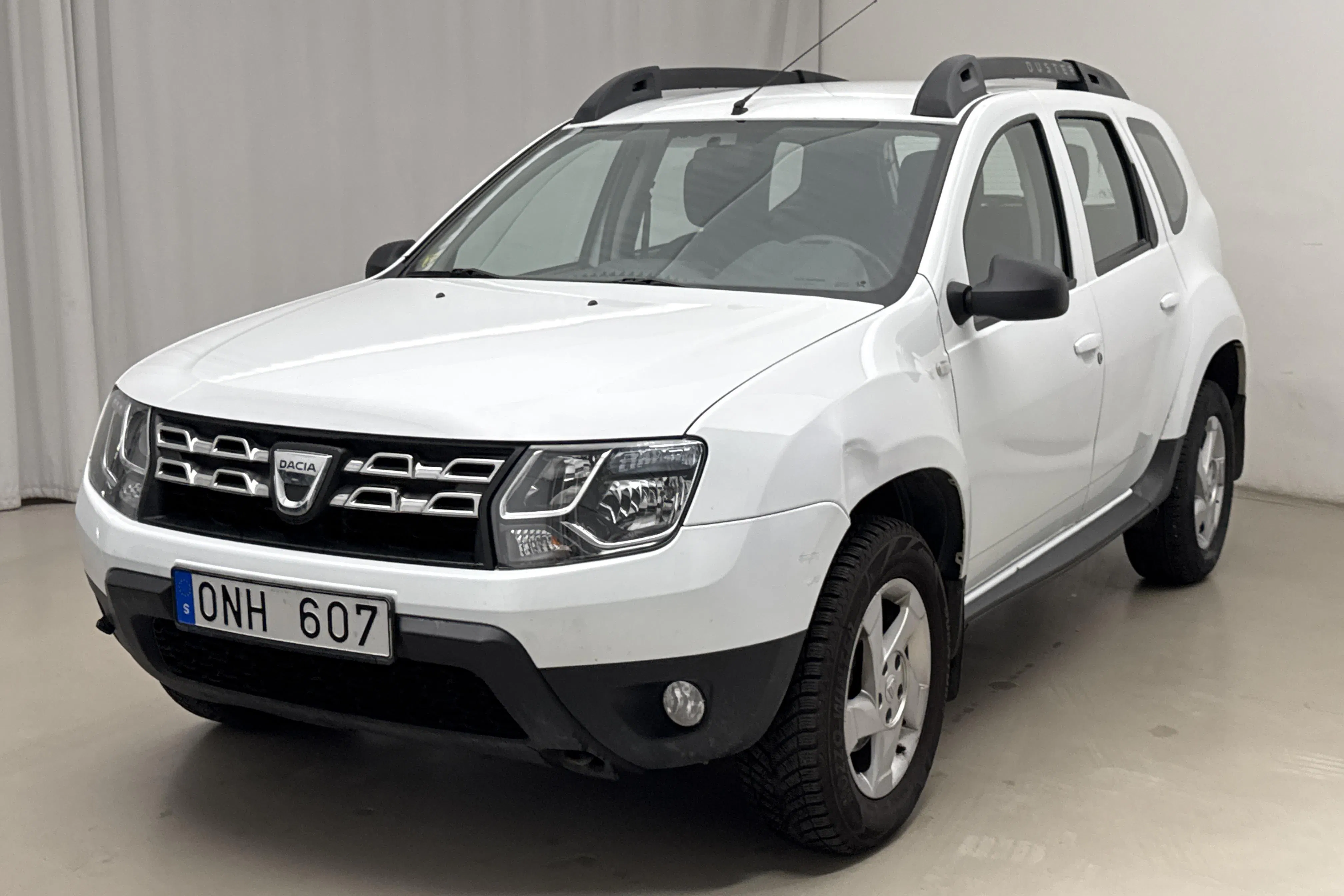 Presentation photo 1 of 13: Dacia Duster 1.5 dCi 4x2 (109hk) - 78 870 km - Manual - white - 2014