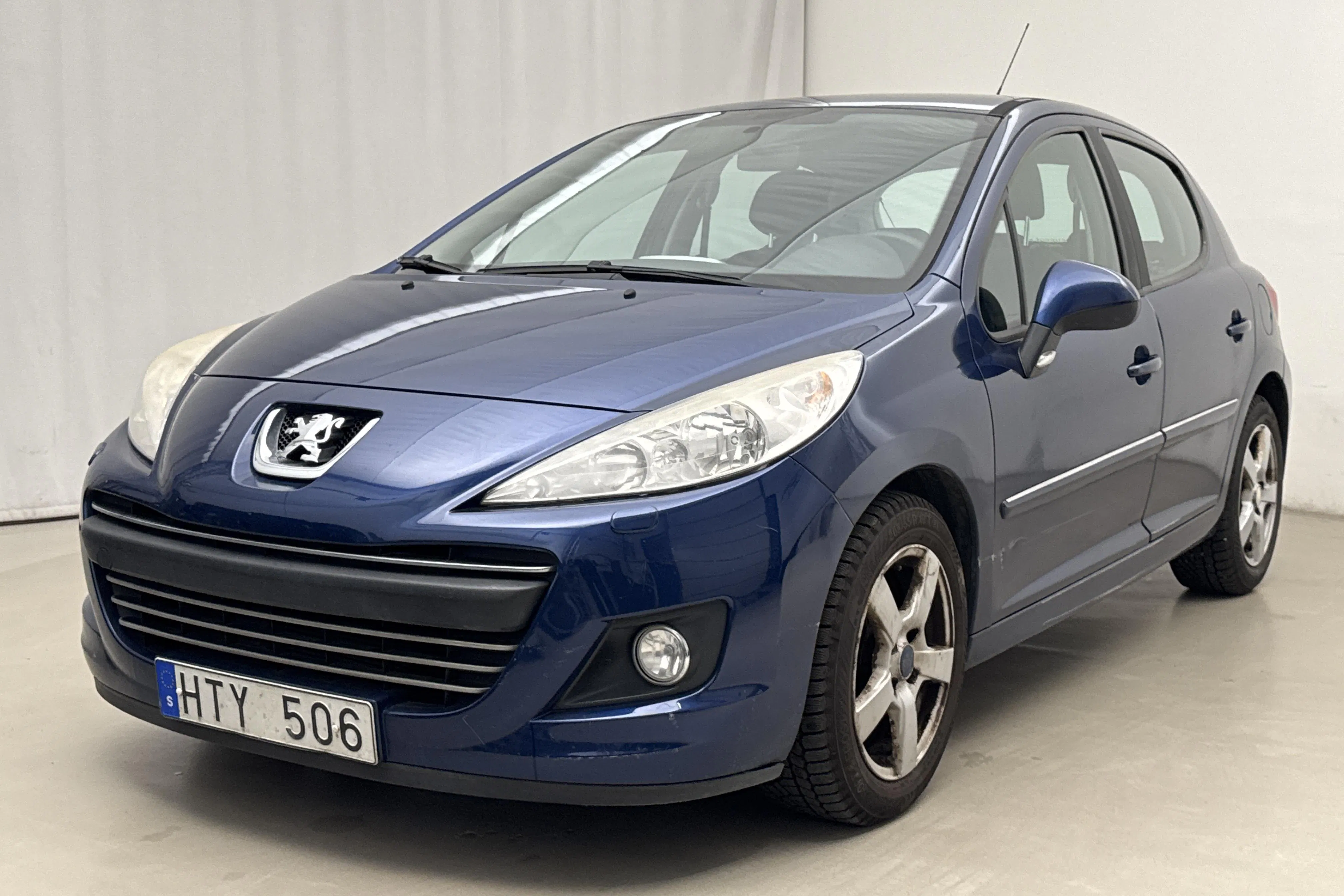 Presentationsfoto 1 av 14: Peugeot 207 1.6 VTi 5dr (120hk) - 14 468 mil - Automat - Mörkblå - 2010