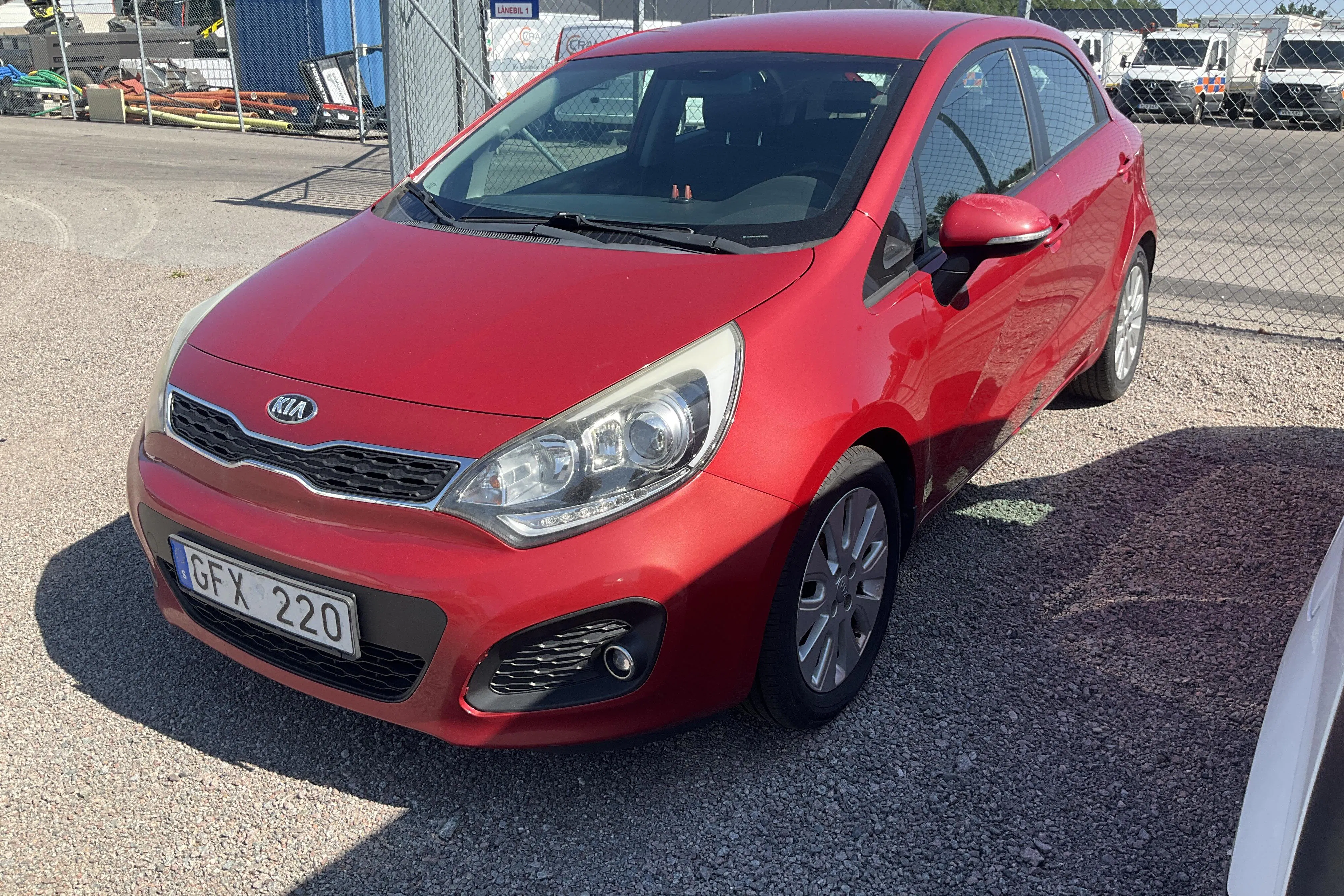 Presentation photo 1 of 12: KIA Rio 1.2 (85hk) - 165 080 km - Manual - red - 2014