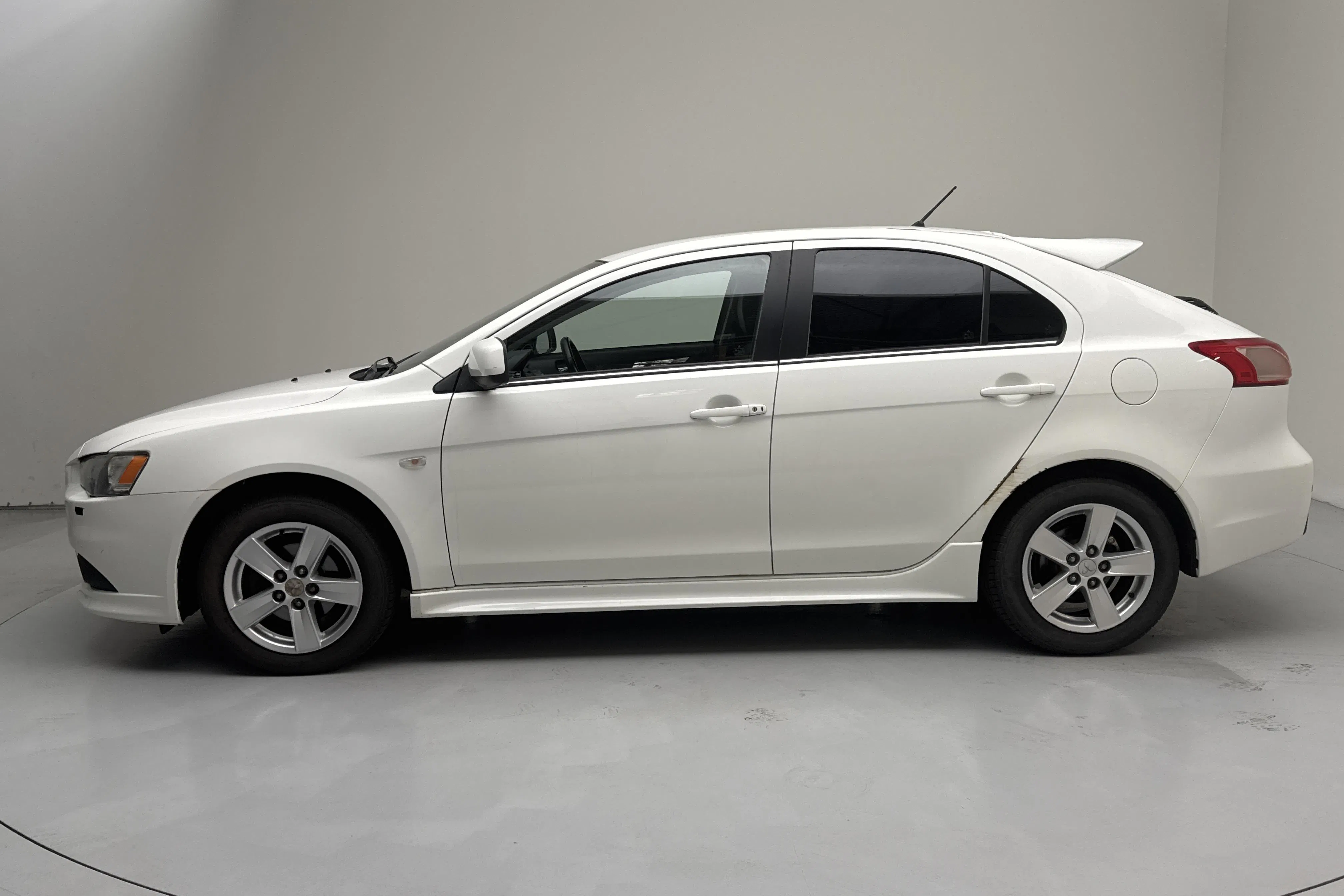Presentationsfoto 2 av 12: Mitsubishi Lancer 1.8 FFV (140hk) - 13 480 mil - Manuell - vit - 2010