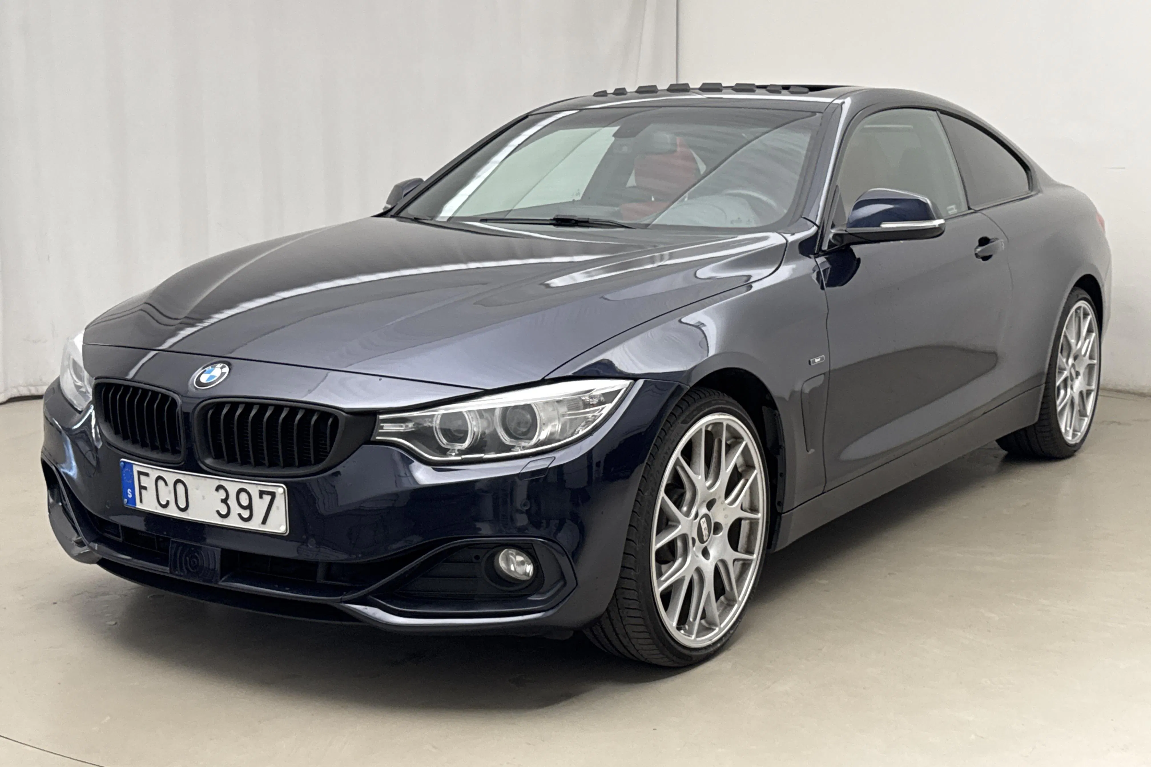 Presentation photo 1 of 23: BMW 435i xDrive Coupé, F32 (306hk) - 145 820 km - Automatic - blue - 2014