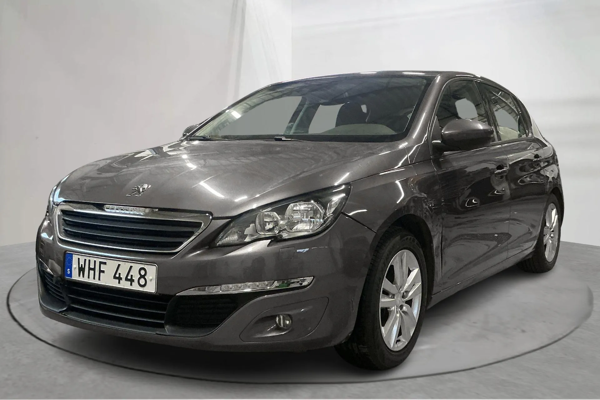Presentationsfoto 1 av 14: Peugeot 308 PureTech 5dr (110hk) - 8 665 mil - Manuell - brun - 2015
