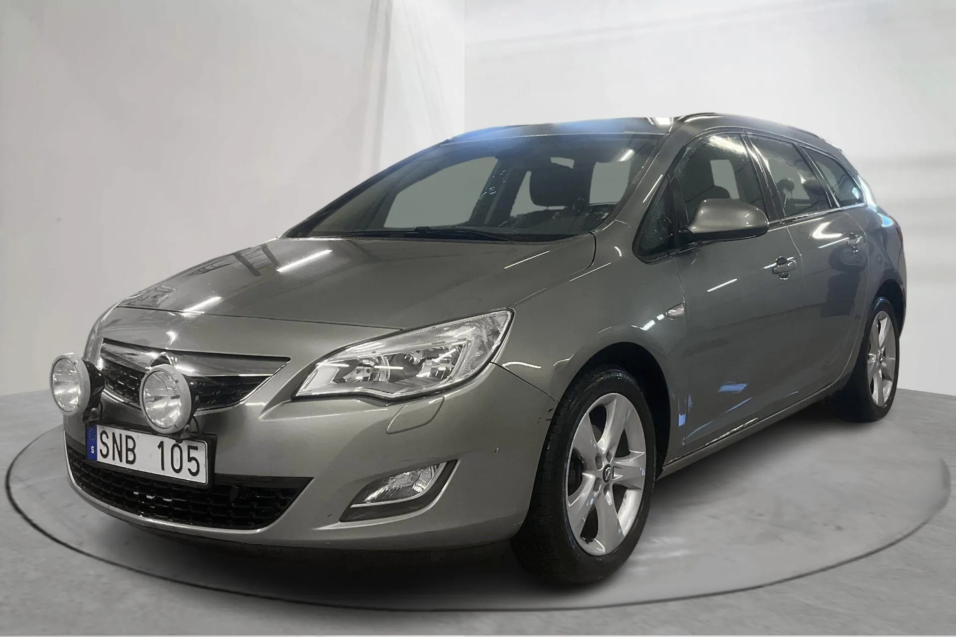 Presentation photo 1 of 17: Opel Astra 1.4 Turbo ECOTEC Sports Tourer (140hk) - 174 850 km - Manual - gray - 2011