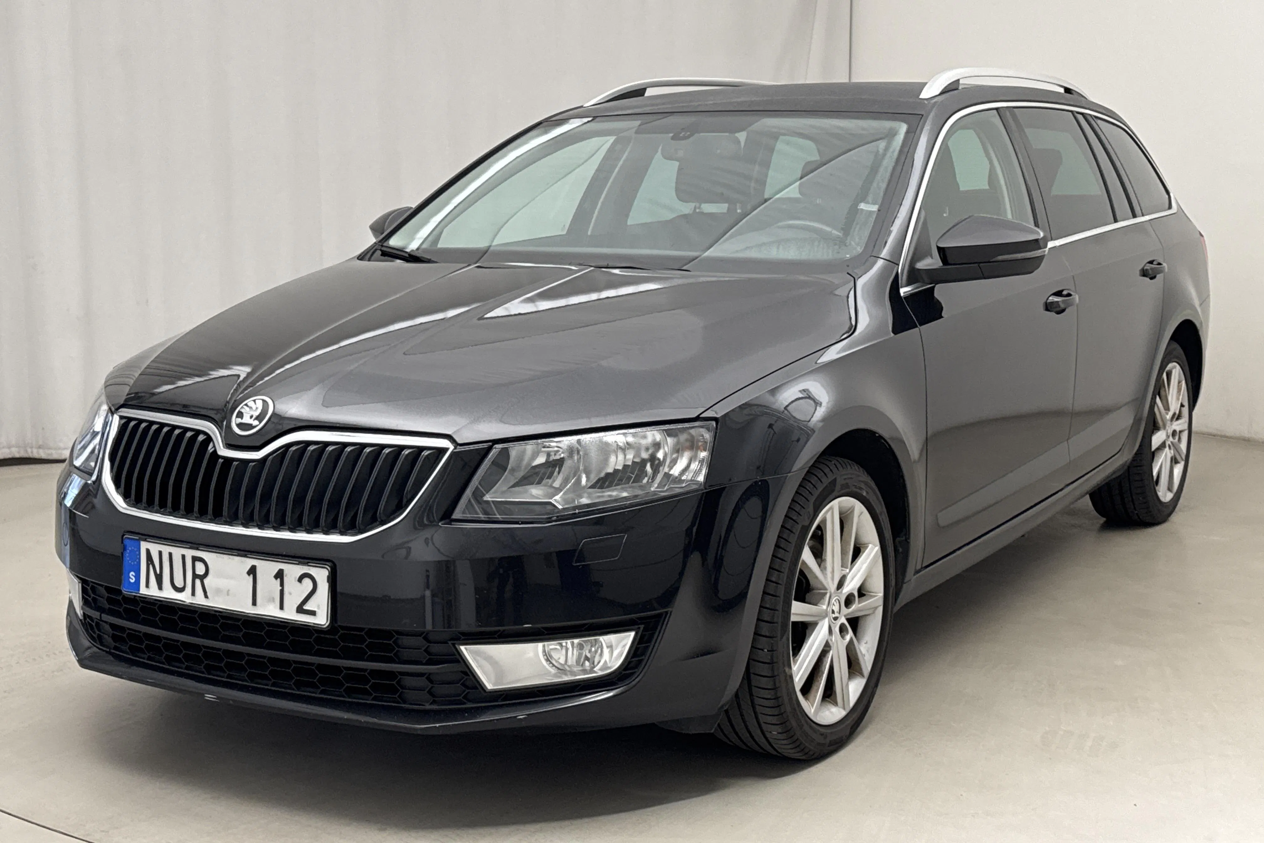 Presentationsfoto 1 av 15: Skoda Octavia III 1.4 TSI Combi (140hk) - 24 025 mil - Manuell - svart - 2014